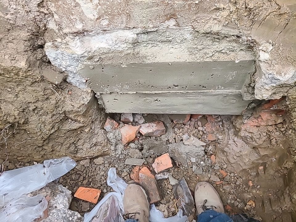 Lifting Home With Piers using Magnum Piers by Toledo Basement Repair