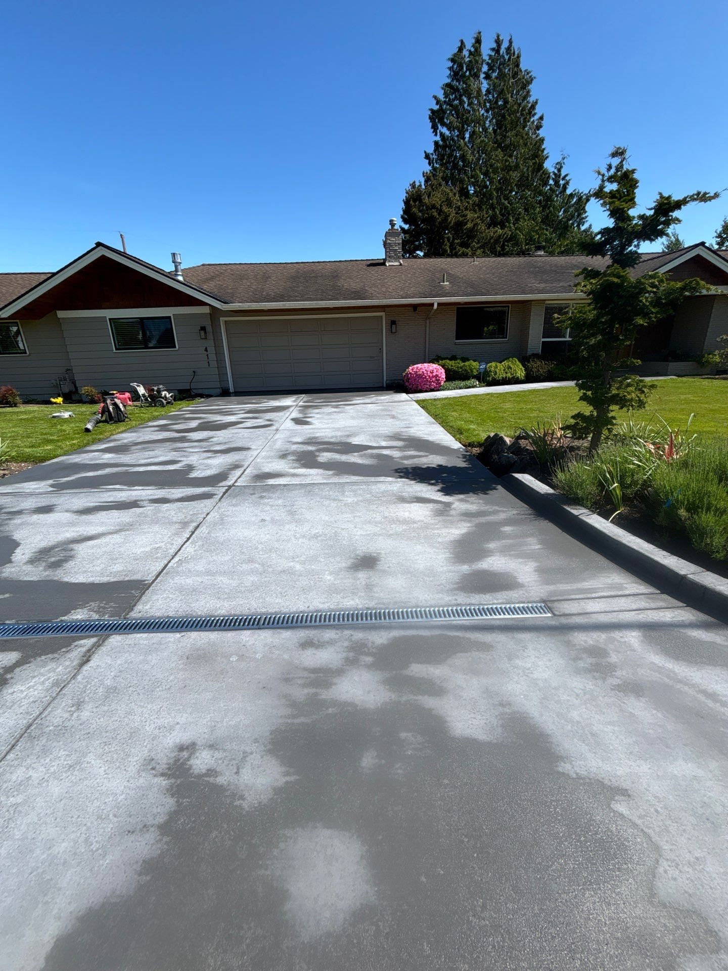 Colored Concrete Driveway Repair with Sealer| Everett    by Jireh Asphalt & Concrete Inc 