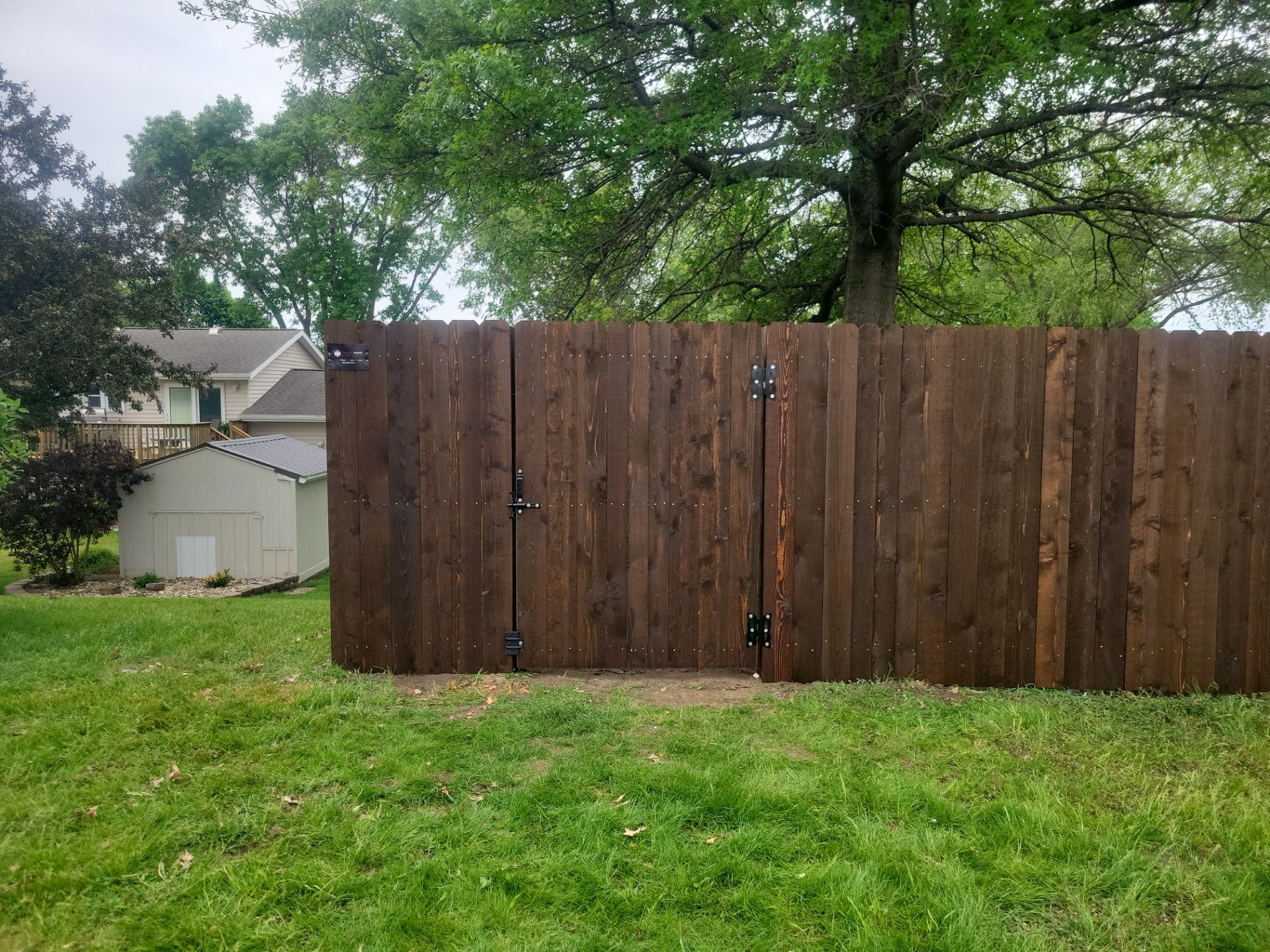 Chain Link and Cedar Privacy in Grundy Center by Perfect Picket Fence and Stain