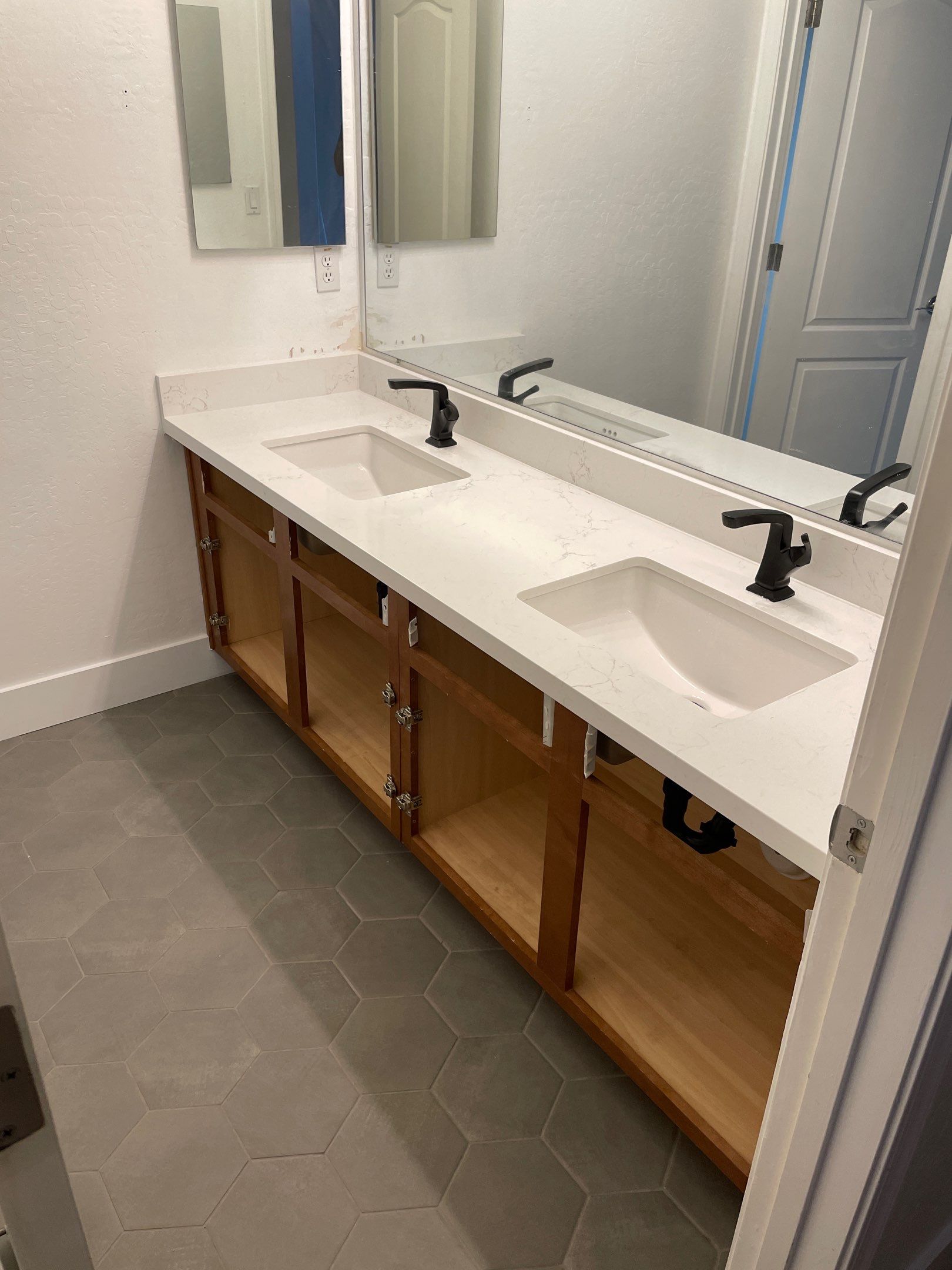New Shower, Bathroom Floor and Countertops by Footprints Floors of Chandler