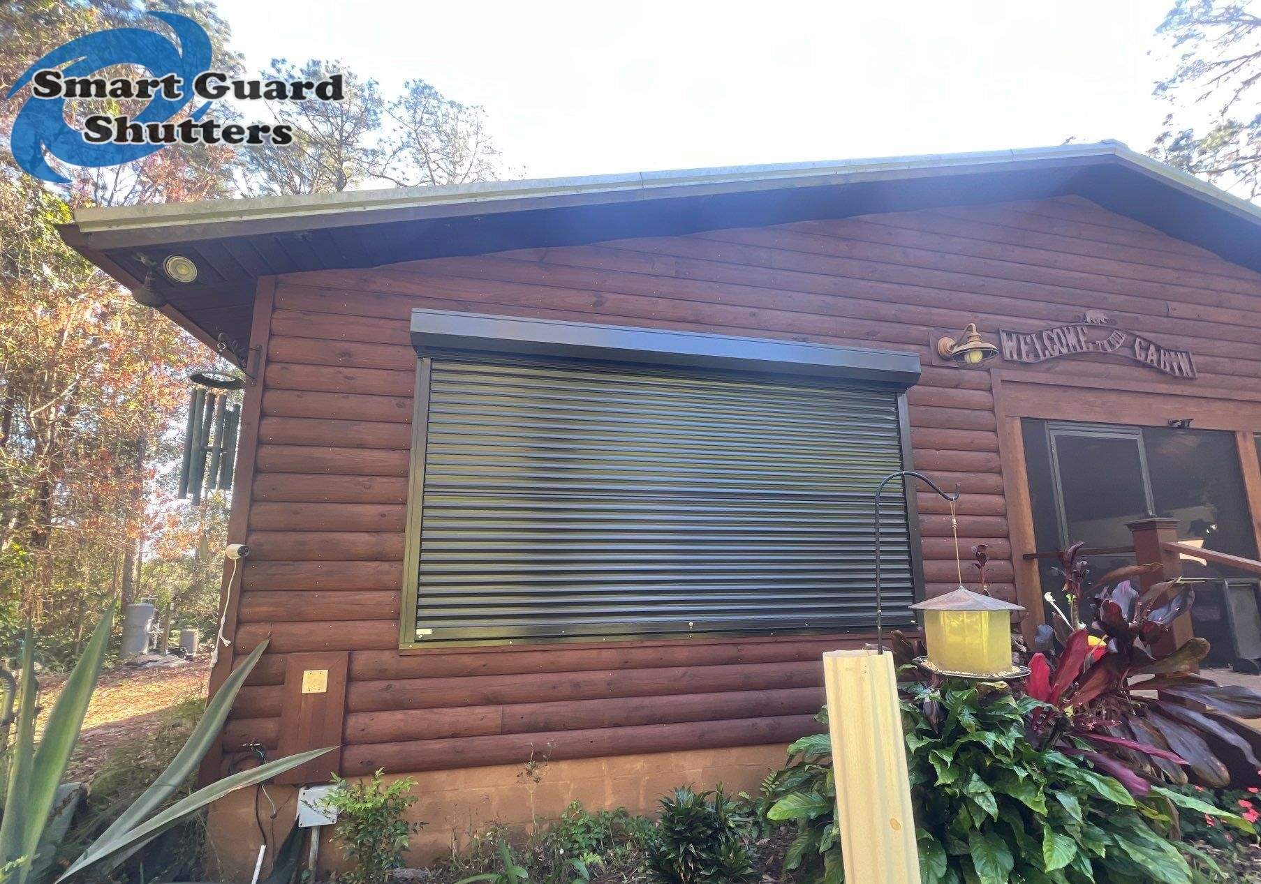 Hurricane Protection in Bronze/Grey Brown by Smart Guard Shutters