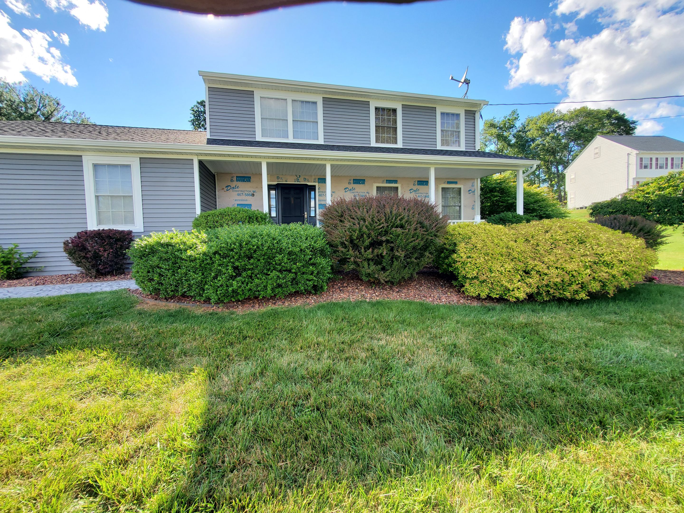 Siding Installation using Certainteed Monogram Charcoal gray and Owens Corning Versetta Stone Sterling by A Plus Exterior