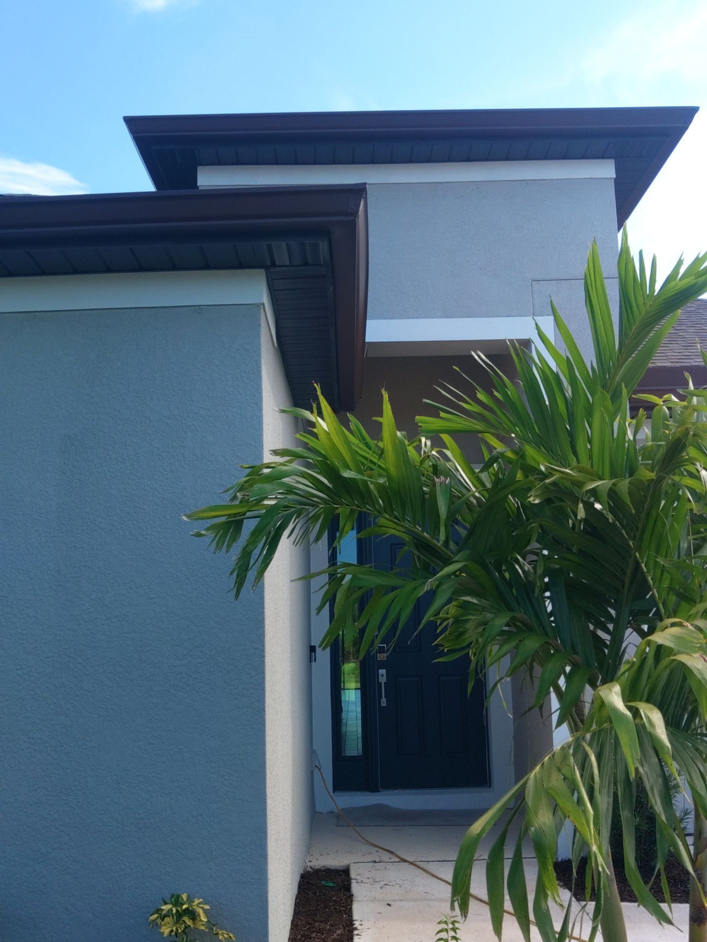 Musket Brown Seamless Gutters using Musket Brown Seamless Gutters in Nokomis FL by Gutter Professors