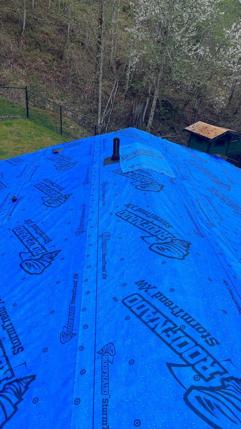 Residential ReRoofing Installation using 12" Prolok metal by Top Notch Roofing Inc
