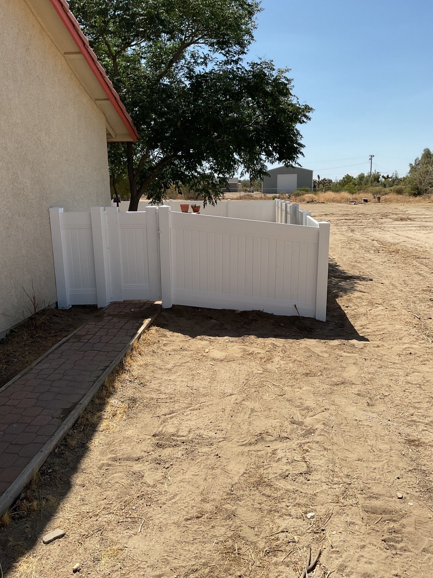 4ft White Vinyl & Chain link Slider Gate with Solar Motor by Fence Guys Inc.