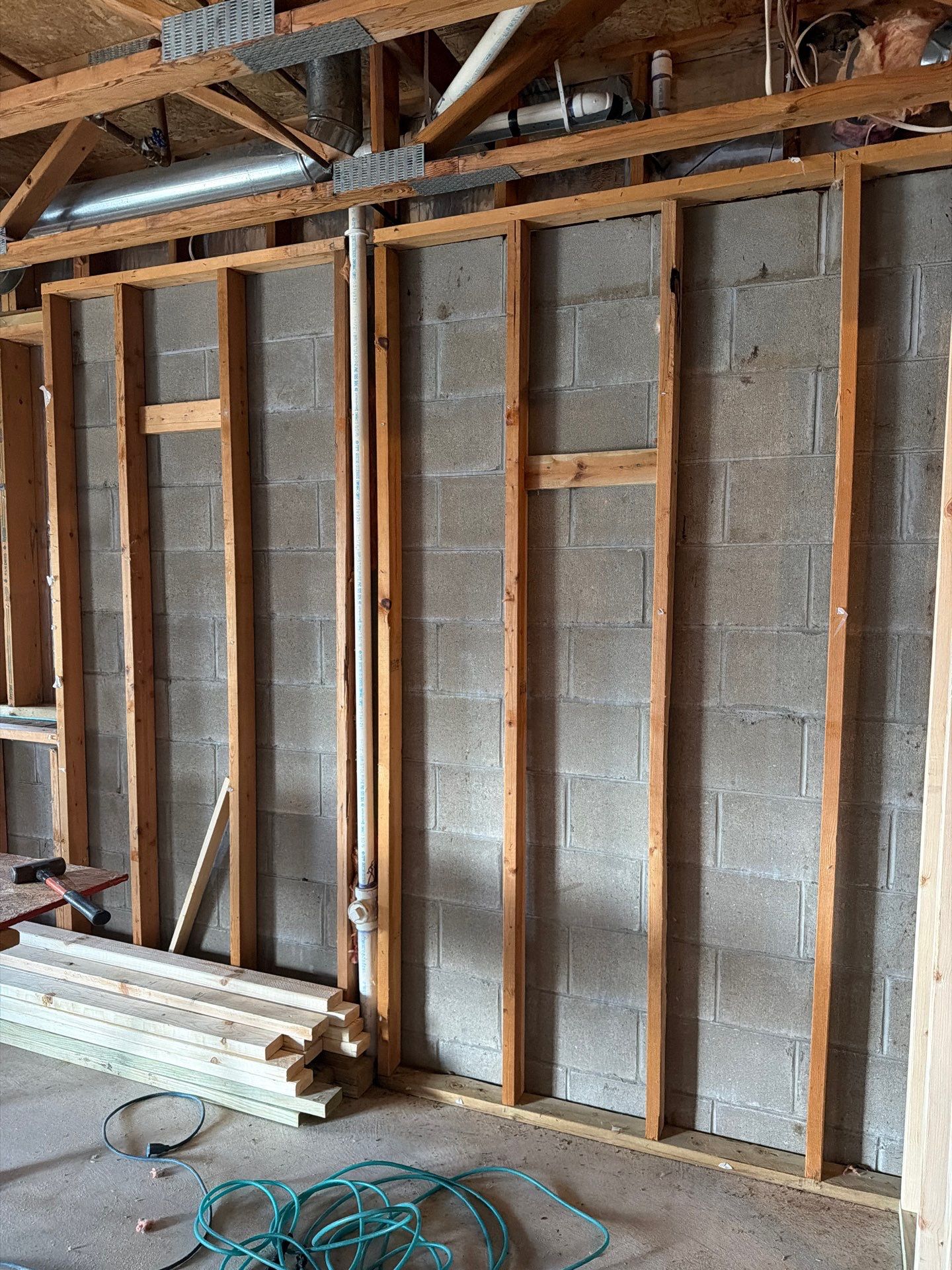 Closed cell Spray foam basement walls in Andover by Gunner Insulation and General Contracting