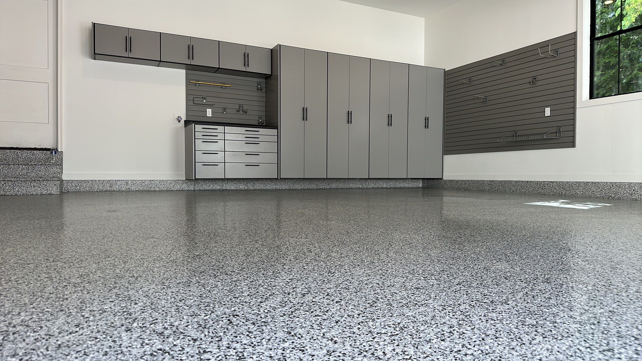 Jeanne E. transformed her garage with cabinets and a Banner Garage Floor by Banner Garage