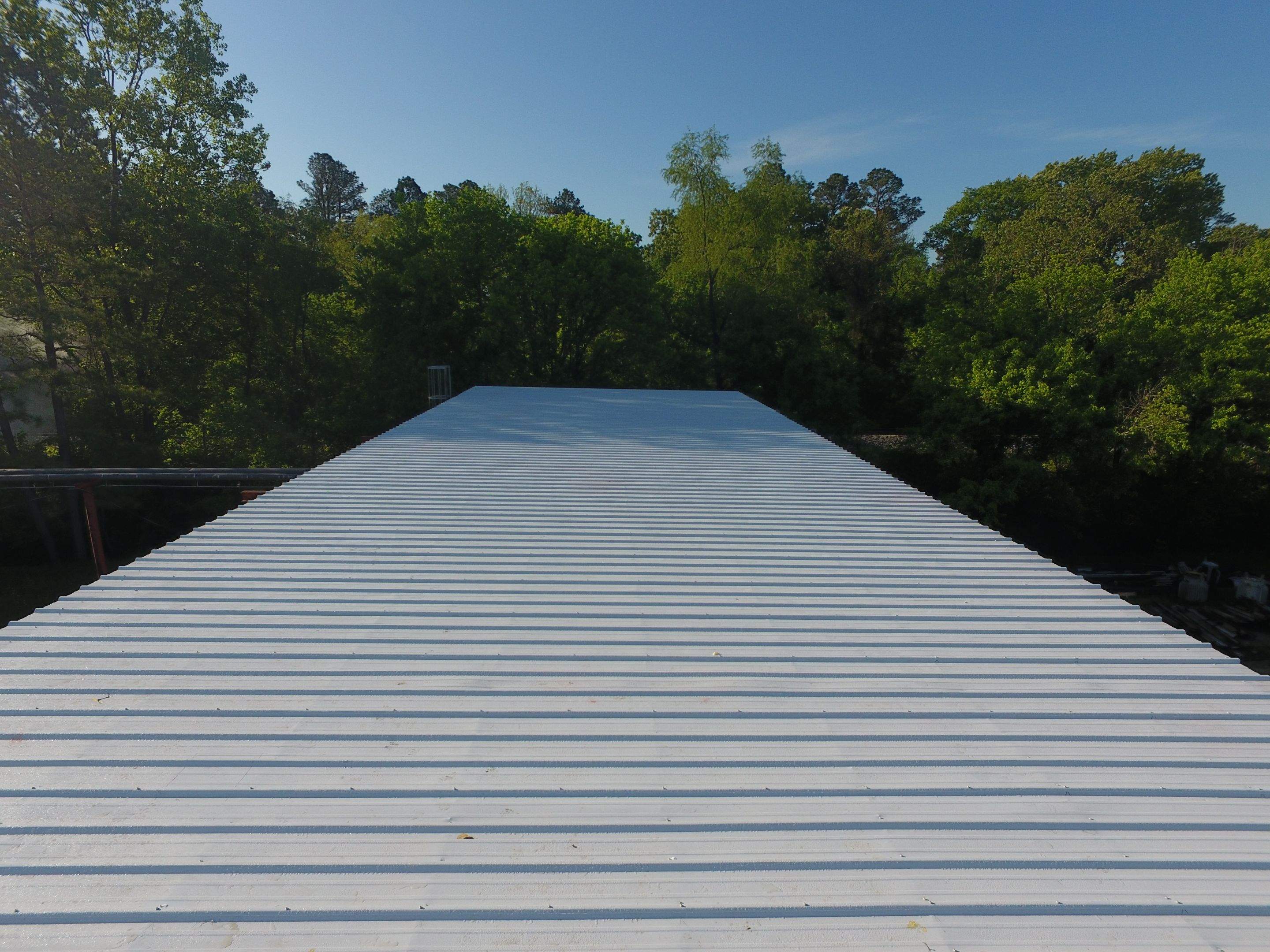 Commercial Roofing Installation using Aluminum Roofing panels by Hostetler Roofing