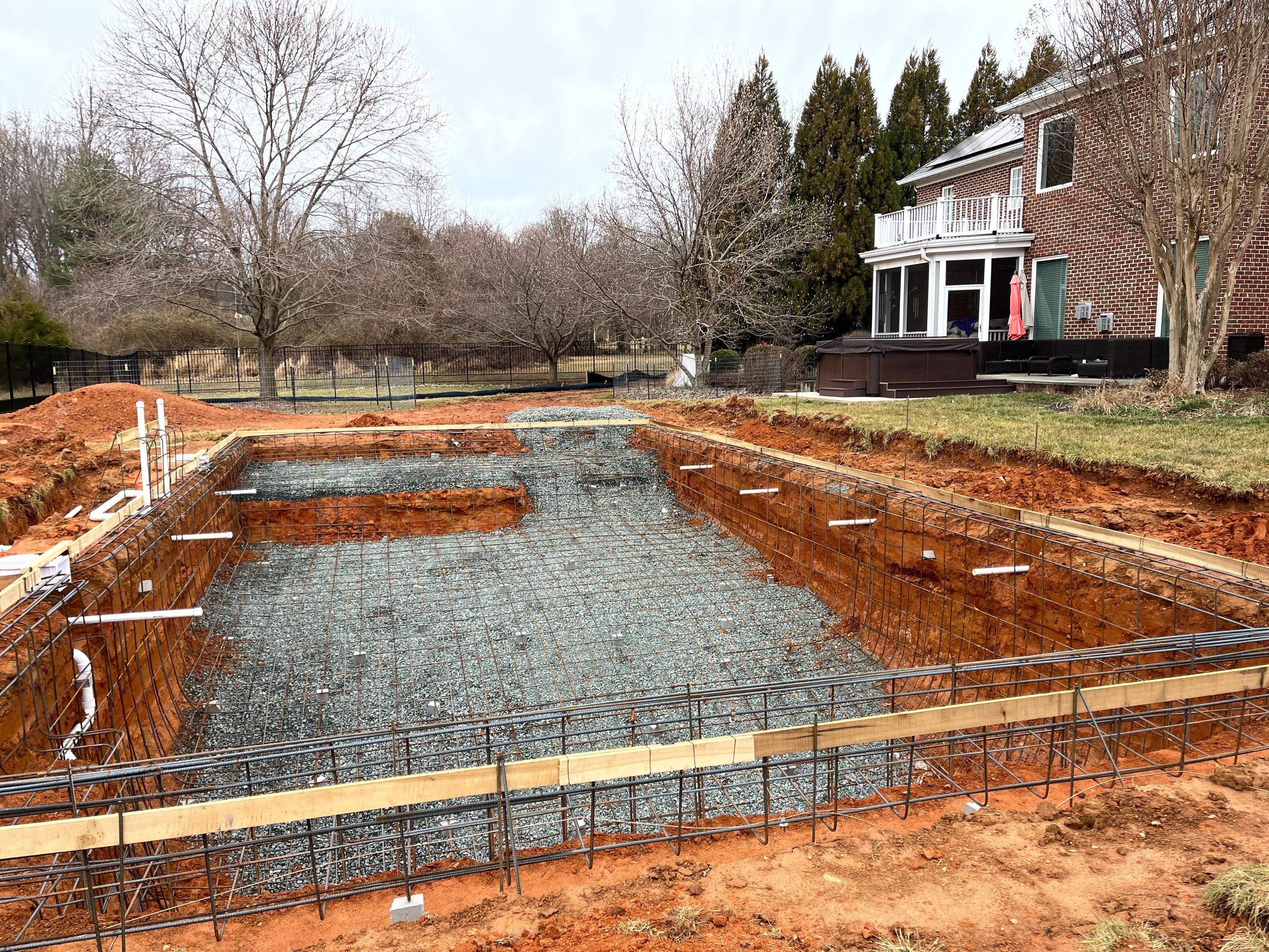 Gunite Pool w/ Raised Waterfall and Autocover  by Elysium Pools