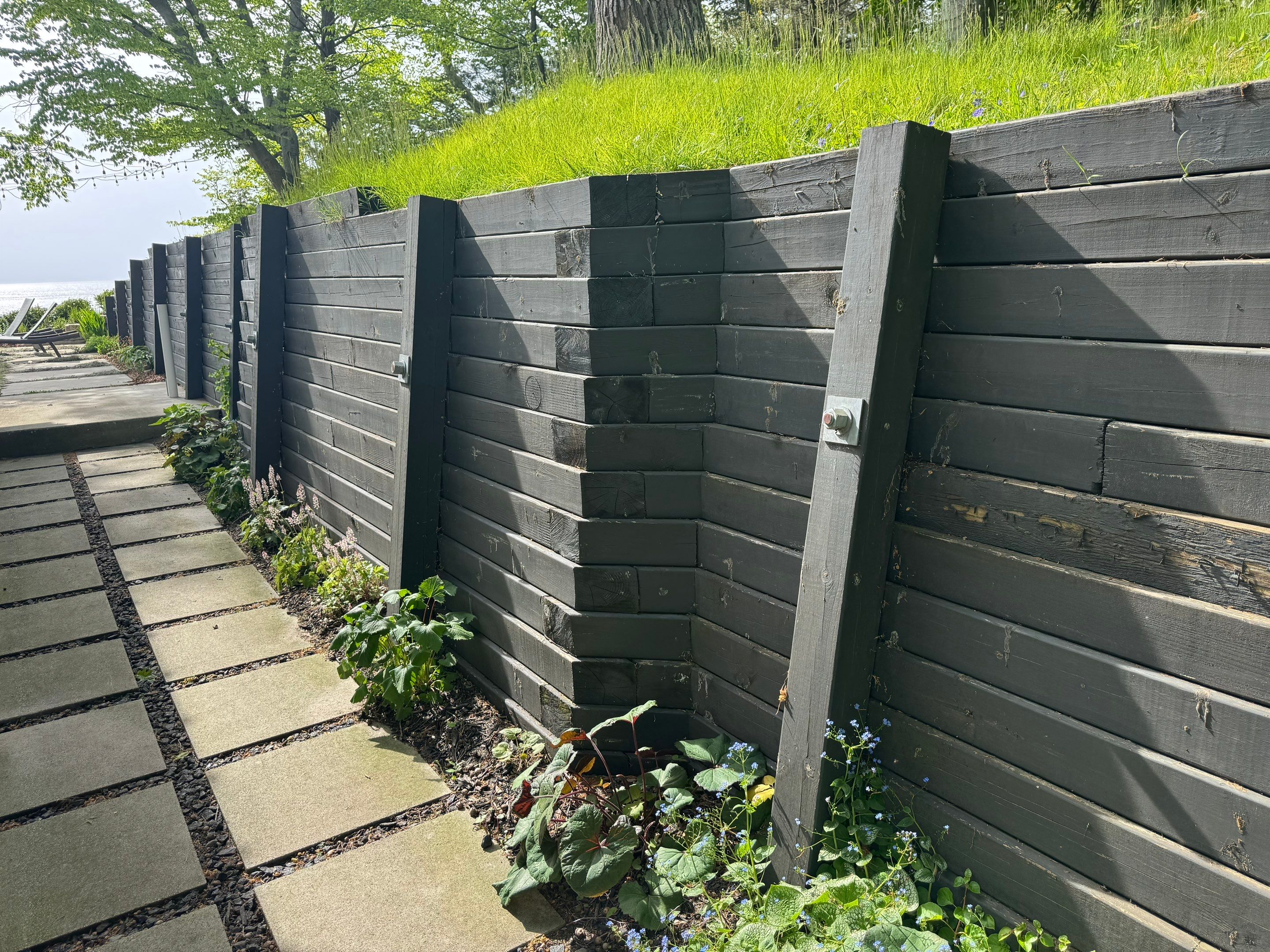 Exterior Retaining Wall Painting | Grand Haven, Michigan by Gordon Painting