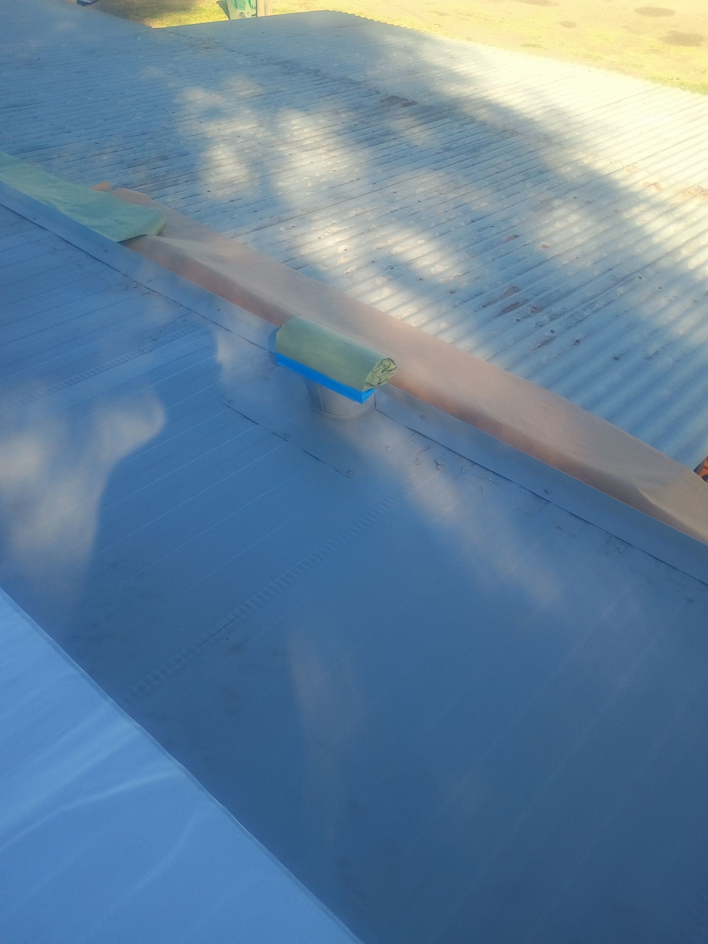 Foam and coatings on mobile home by Straight Edge Roofing Inc