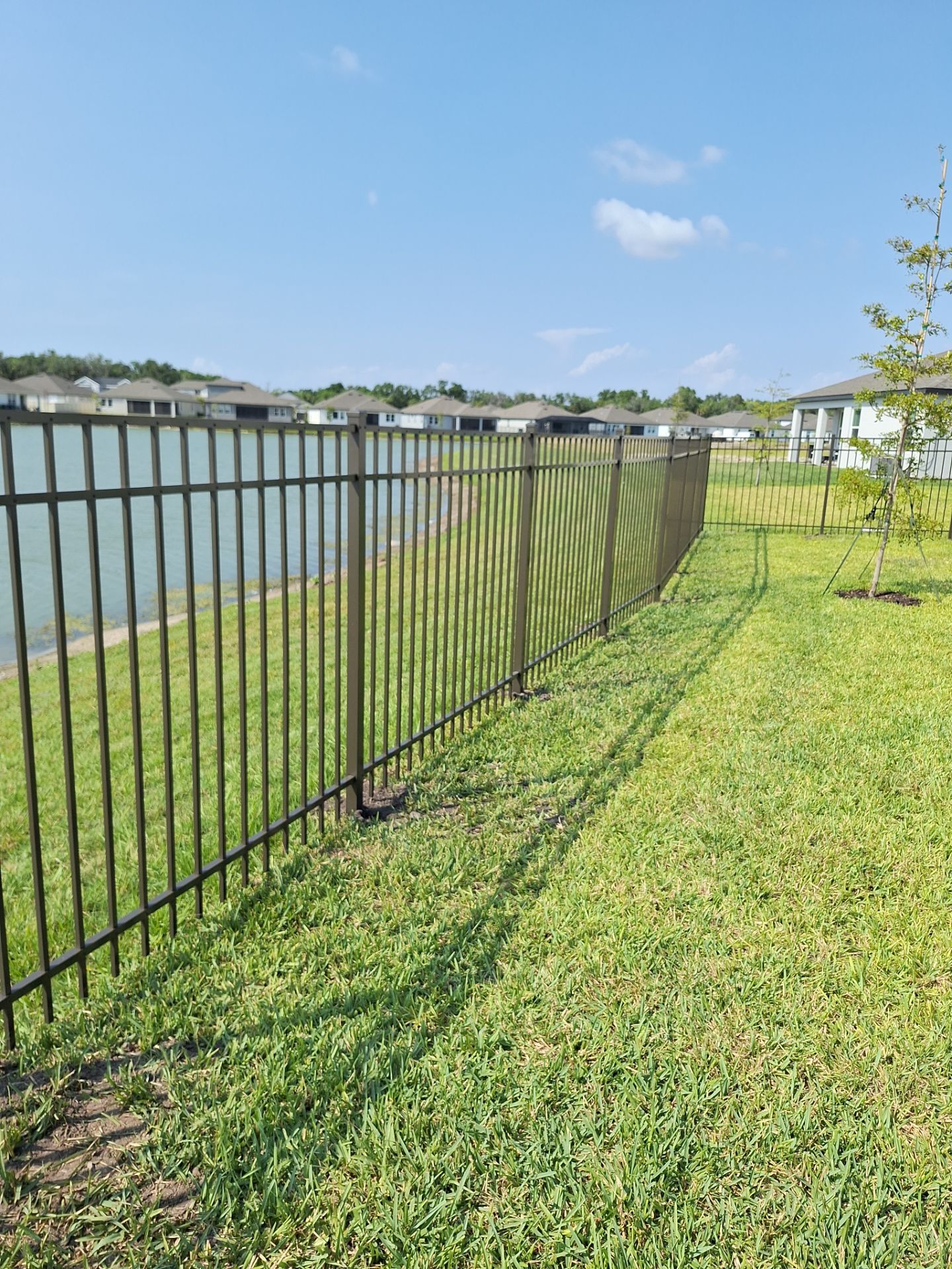 Aluminum Fence Installation using Black 3 Rail Aluminum Fence by Asap fence and gates, LLC
