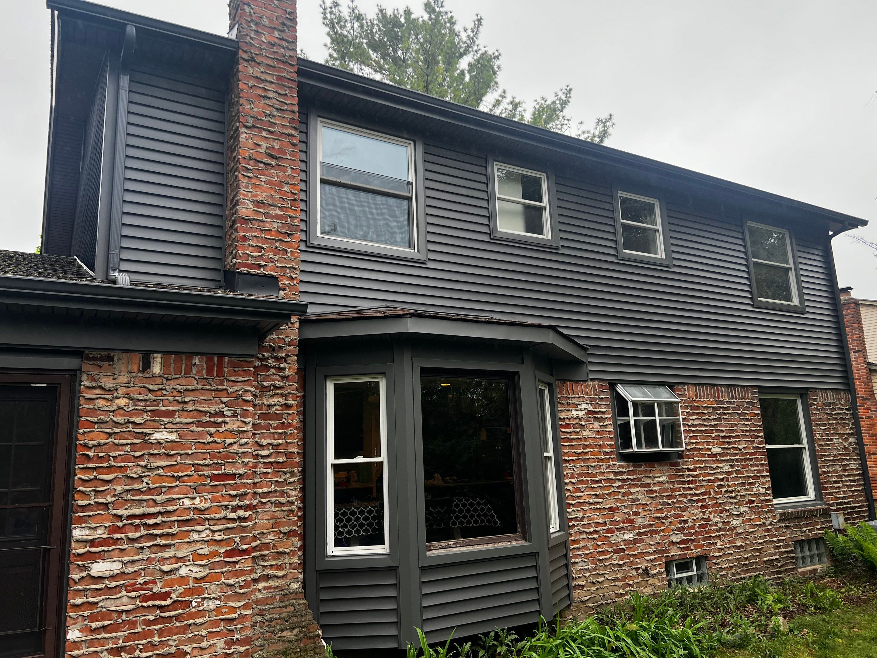 Siding Replacement  using Certainteed Monogram Vinyl D4" Smoky Gray color by Bloomfield Construction & Restoration