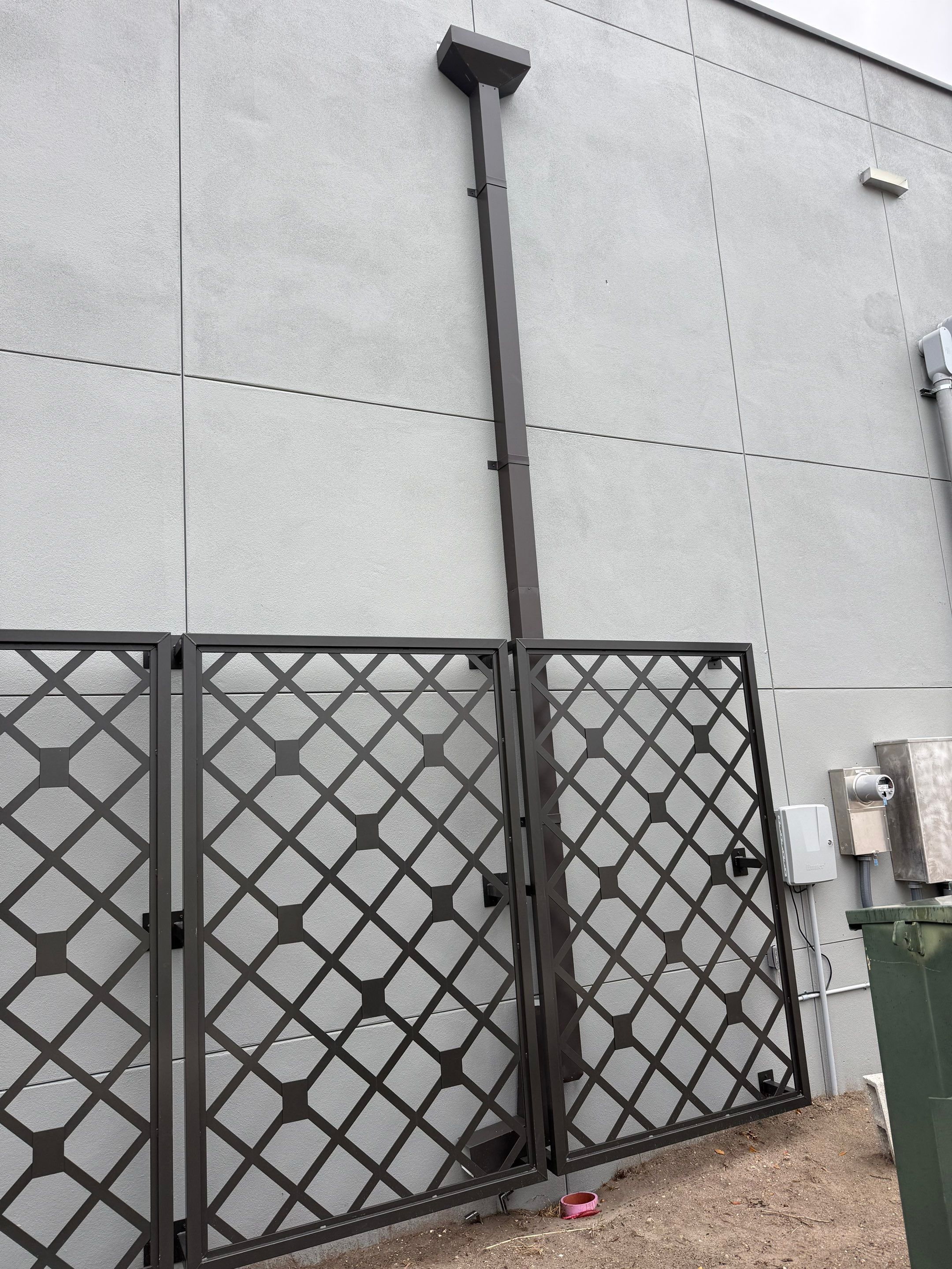 Downspout Installation using collector head in Cape Coral FL by Gutter Professors