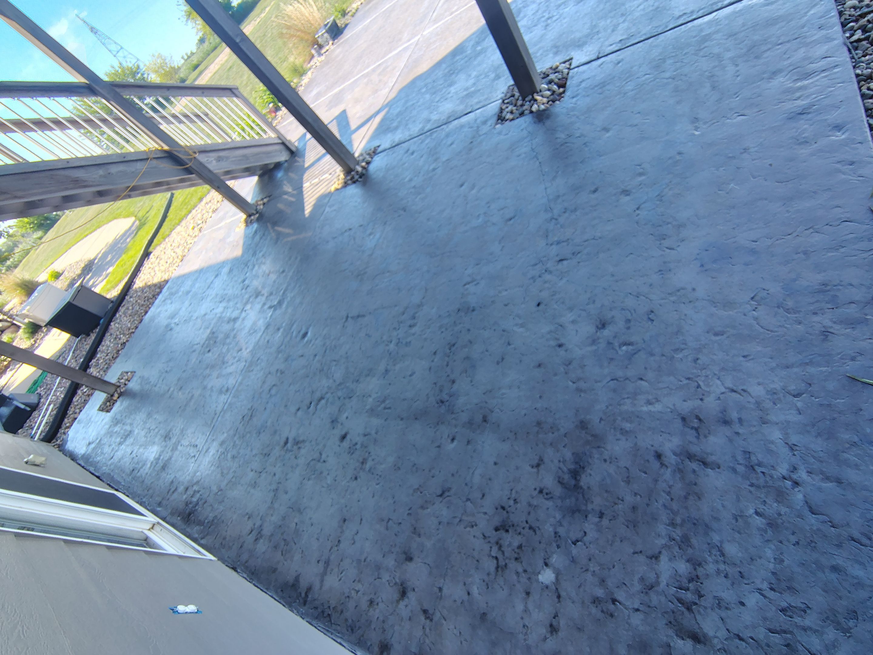 Concrete Patio Restoration and Installation in Sioux Falls by Select Painting, Coatings & Garage Cabinets