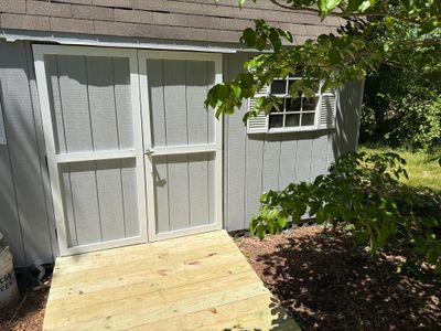 Shed Restoration with New Siding, Door Rebuild & Ramp Installation