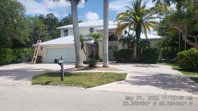 Residential Roofing Installation using 1" Nail strip metal roof