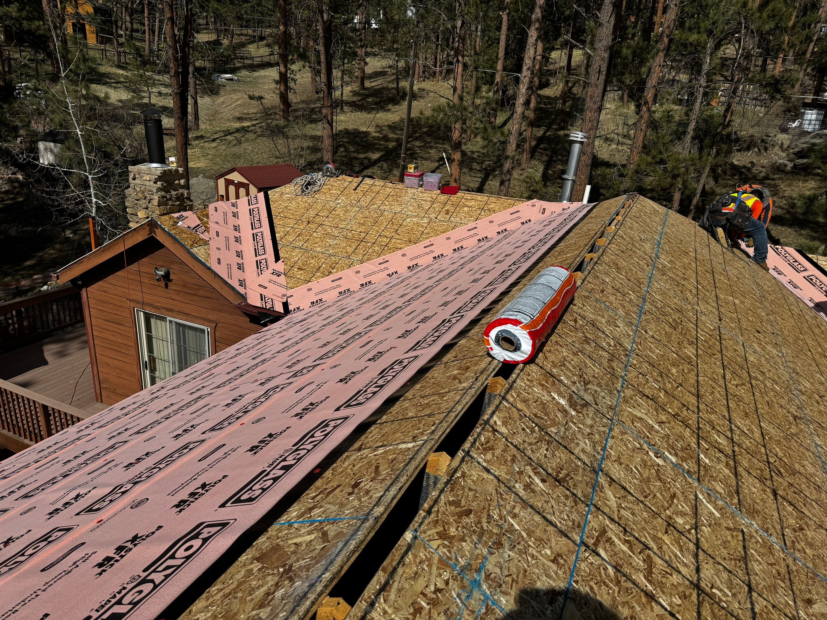 Residential Roofing Installation using Standing Seam Metal by Blue Peaks Roofing LLC 