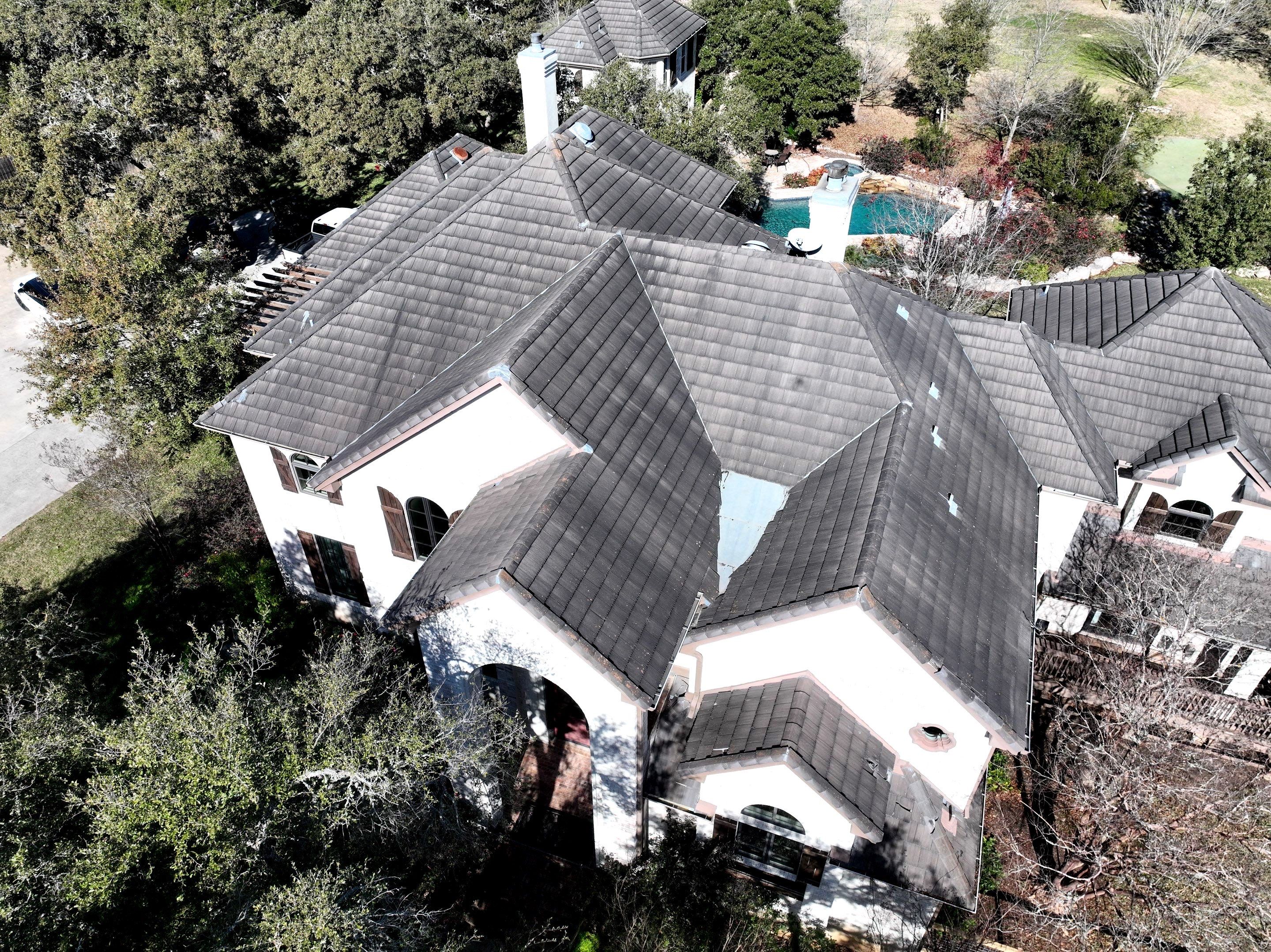 Tile Roof Repair  by Premier Roofing and Contracting