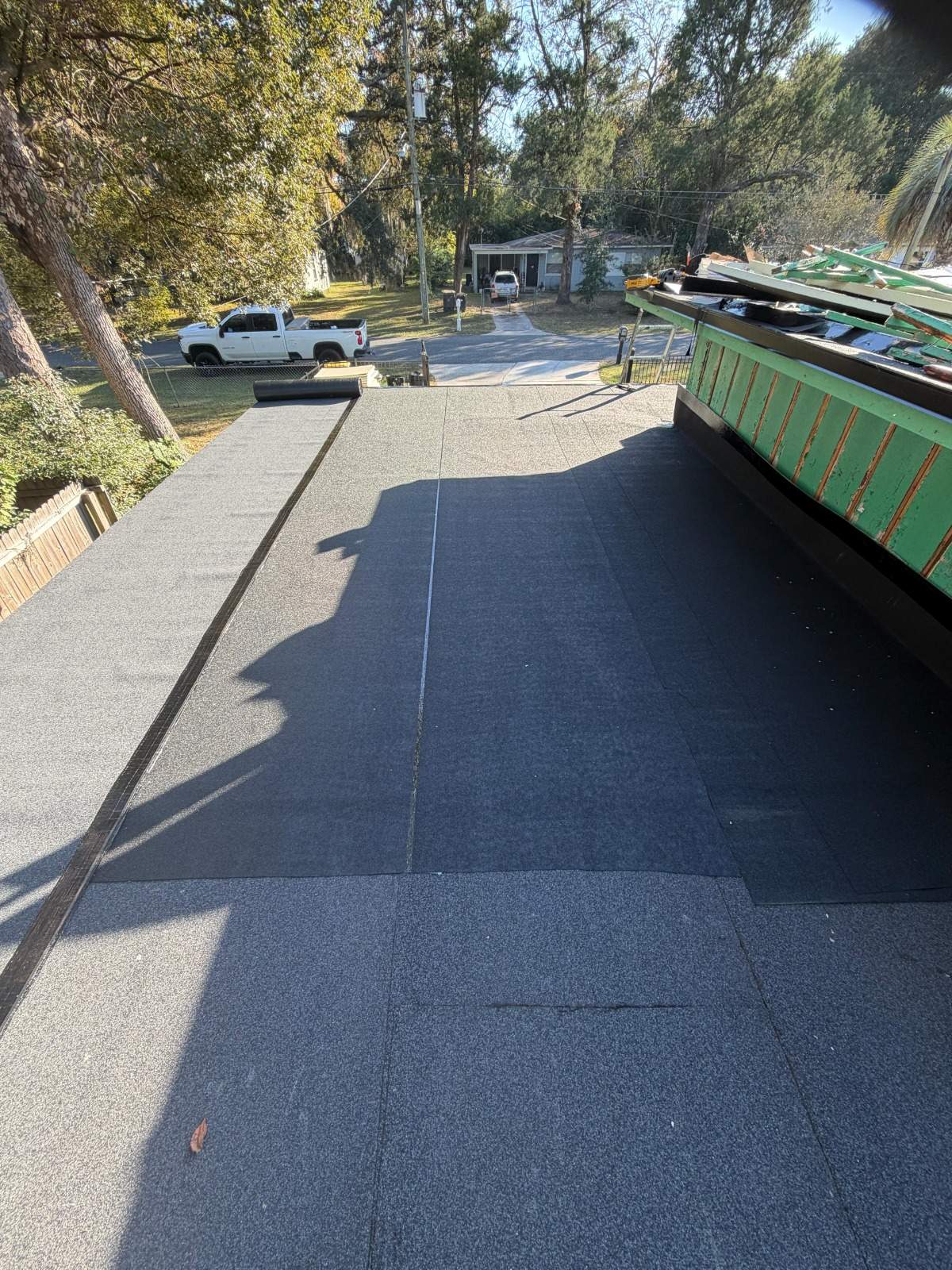 Flat Roof Renovation Due to Water Accumulation by urban green energy llc