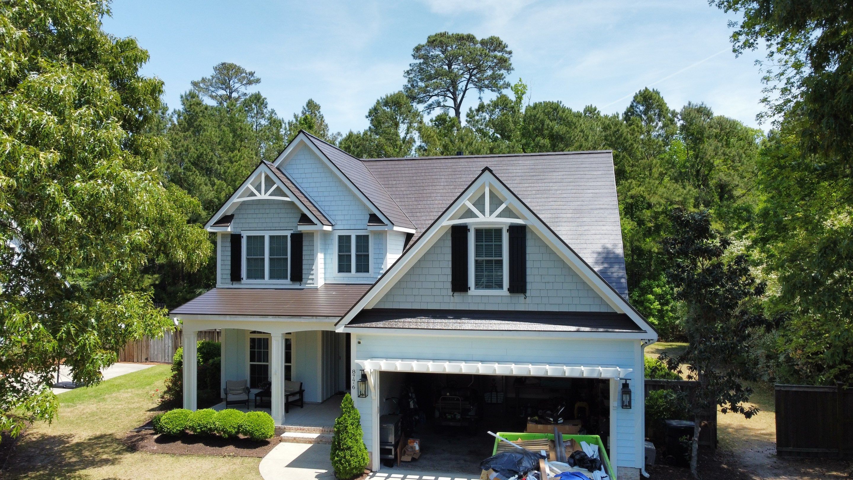 Roof replacement using GAF TimberSteel by American Home Contractors