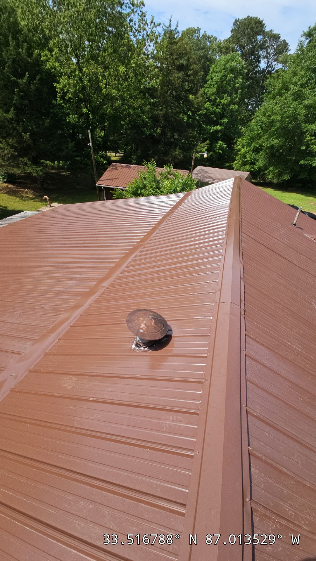 Metal Roof Replacement in Sylvan Springs (Brown) by The Roofing Dudes