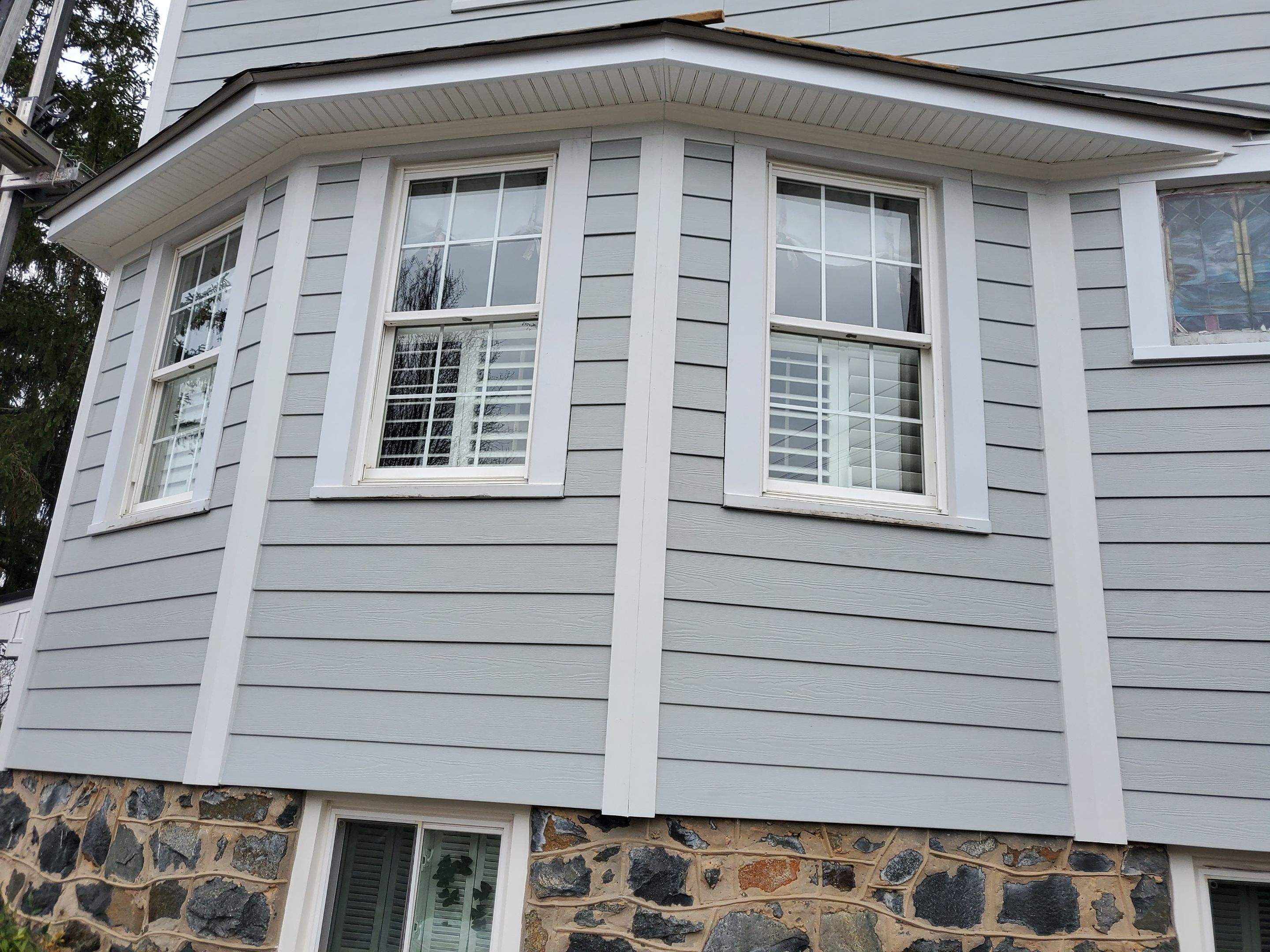 Siding Replacement using James Hardie siding by American Home Contractors
