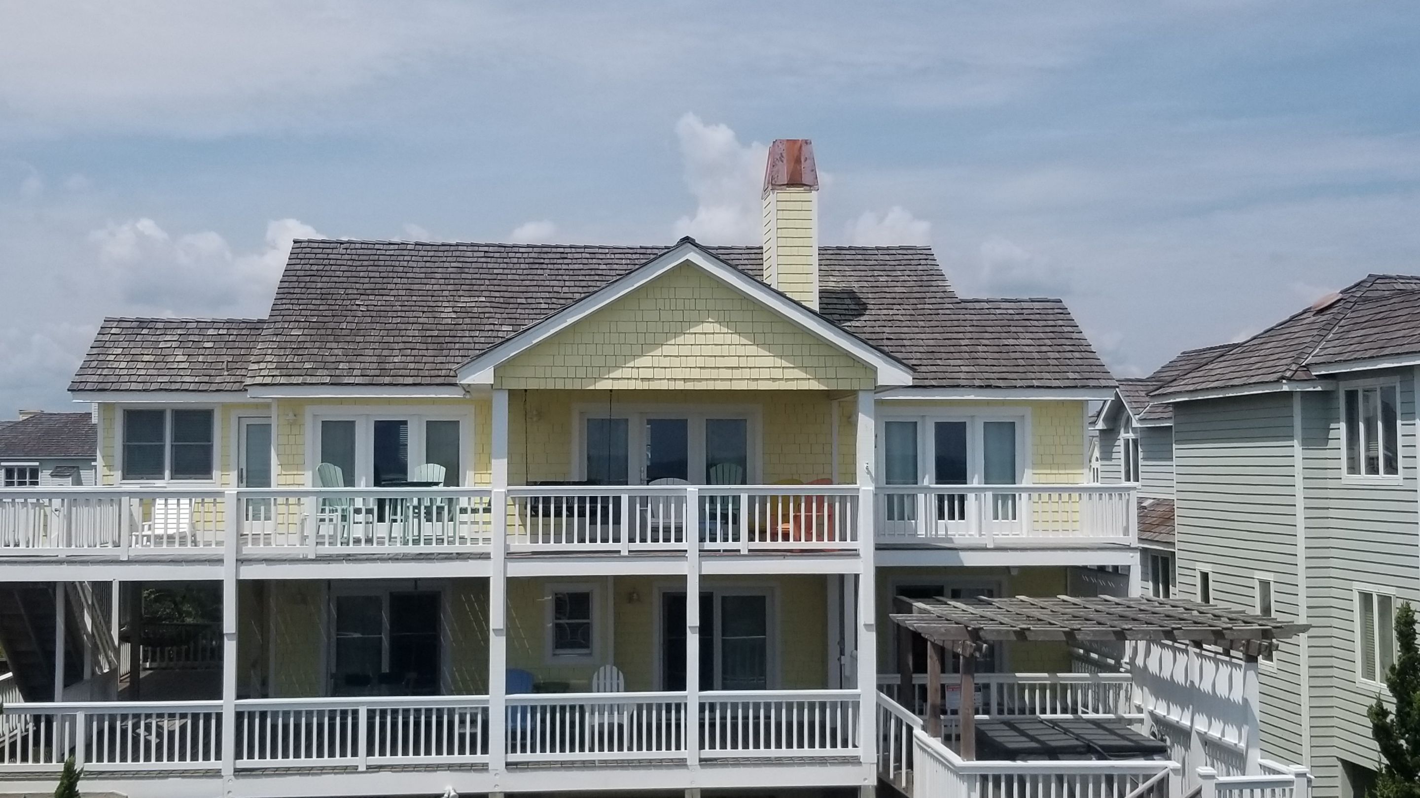Chimney Chase using Copper by Gallop Roofing & Remodeling, Inc.