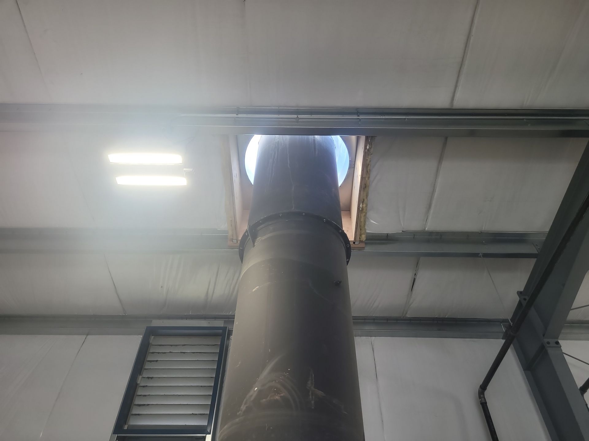 Installing New Curbs on a Metal Roof for new equipment by BEST Roofing & Waterproofing