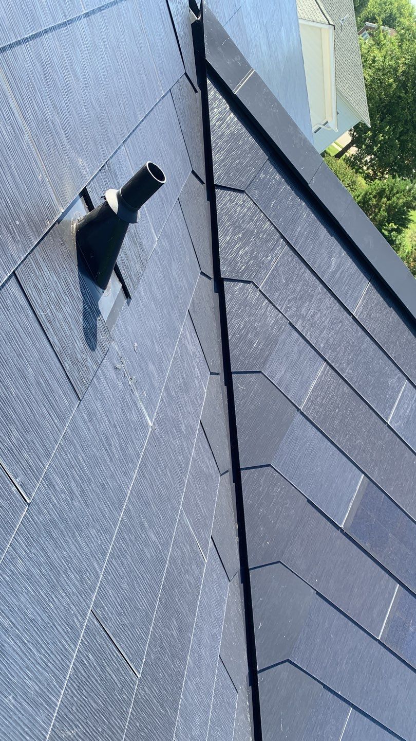 Tesla Solar Roof Replacement using Tesla Solar Roof V3 tiles by American Home Contractors