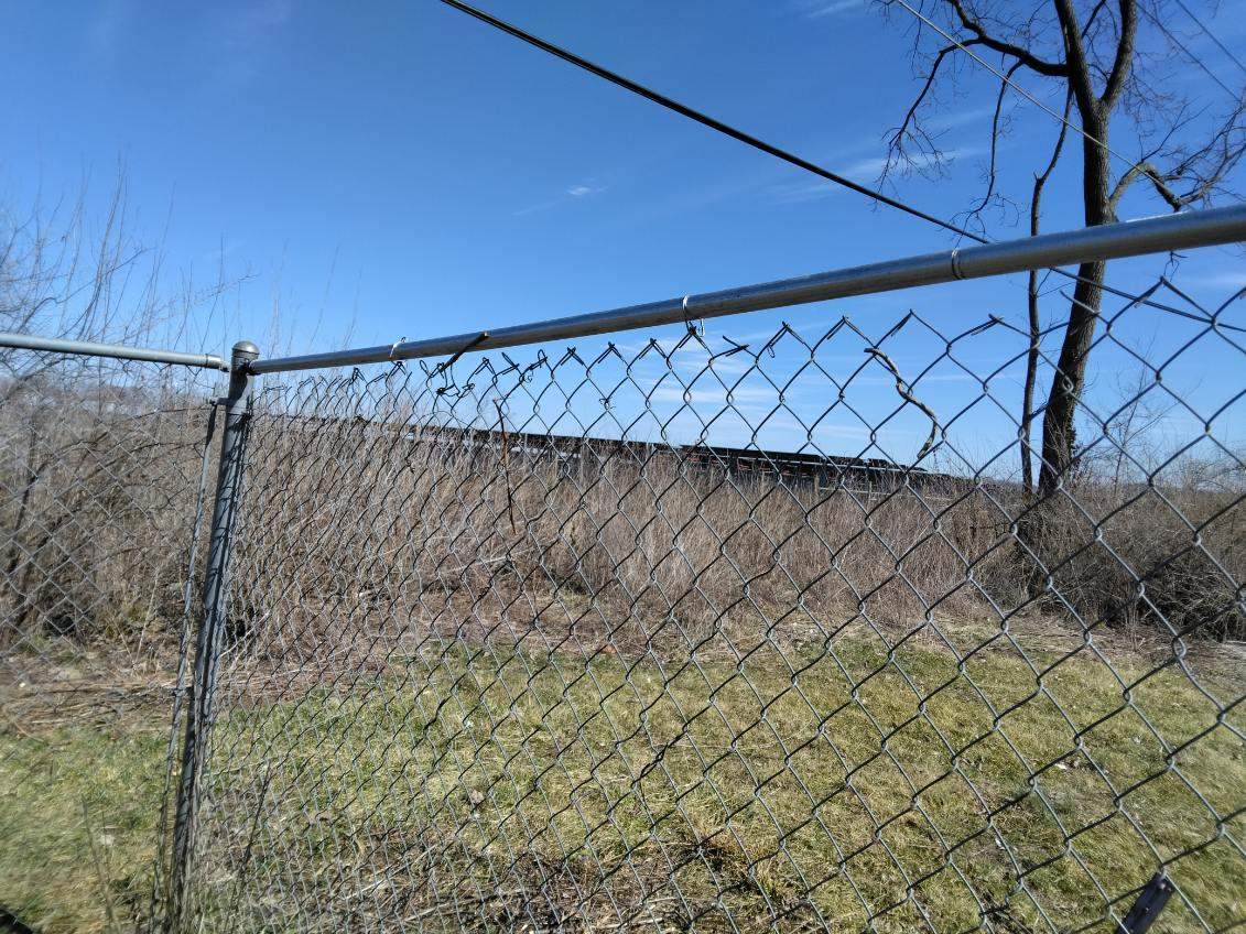 Chain Link Fence Repair and Custom Gate Installation – East St. Louis, IL by Legendary Services Company LLC.