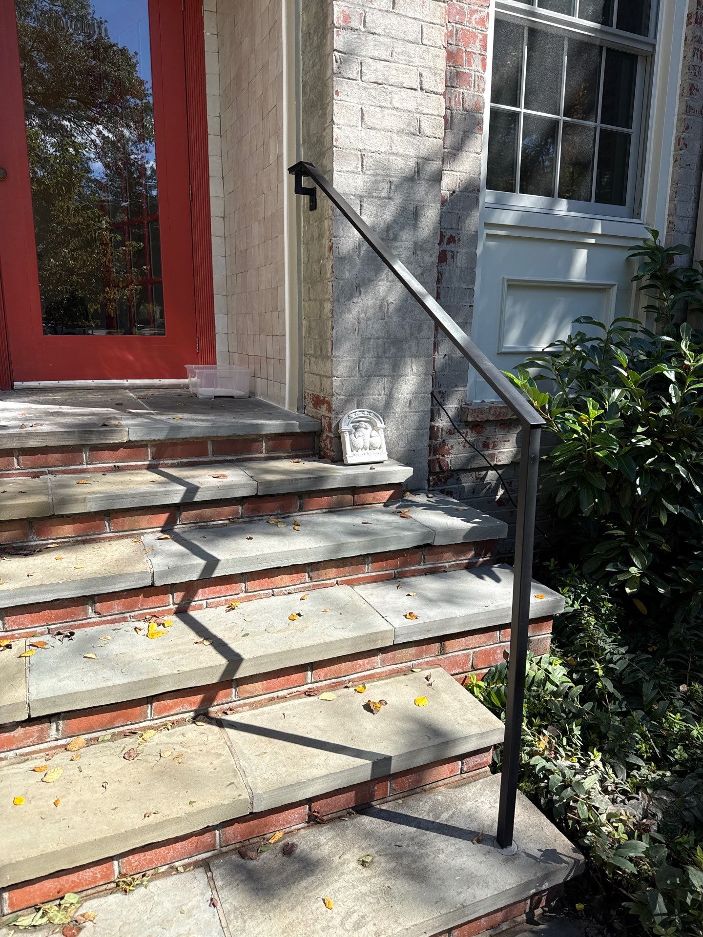 Custom Black Metal Handrail Installation for Chevy Chase Entryway Steps by Capitol Iron Works