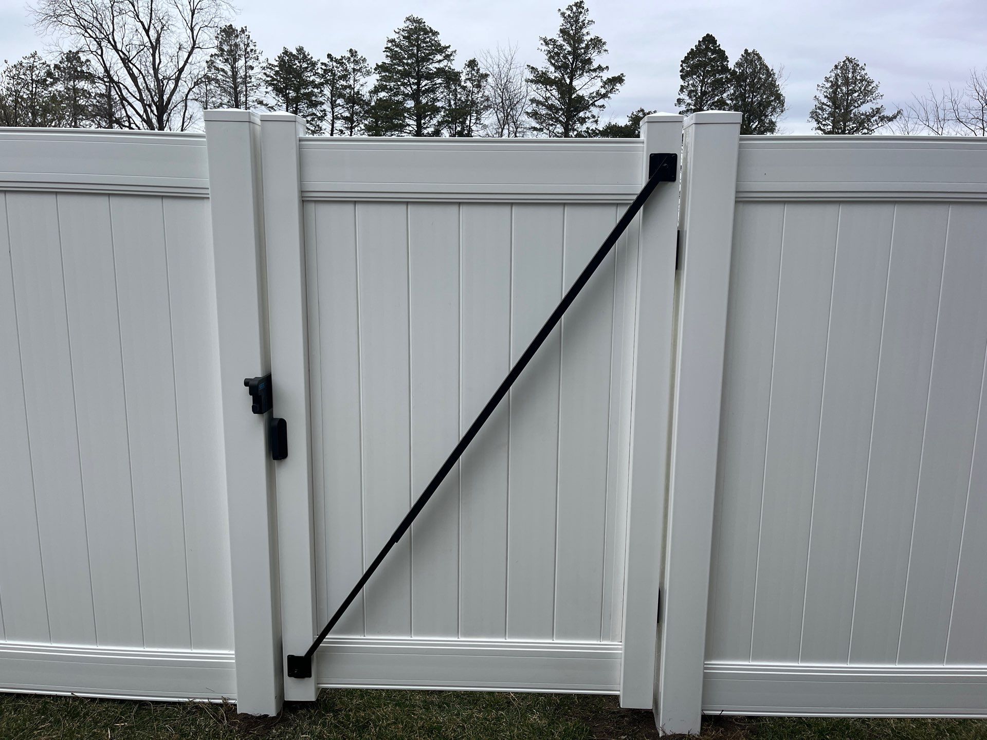 White Vinyl Privacy and Black Chain Link Fencing in Buckingham by Perfect Picket Fence and Stain