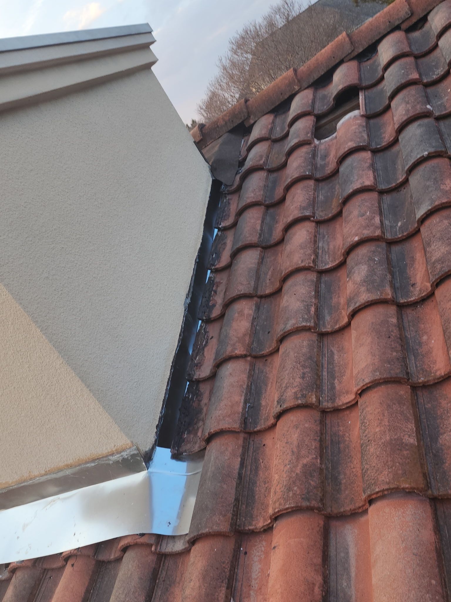 Specializing in tile roof repairs by REPS Austin Area Roofer
