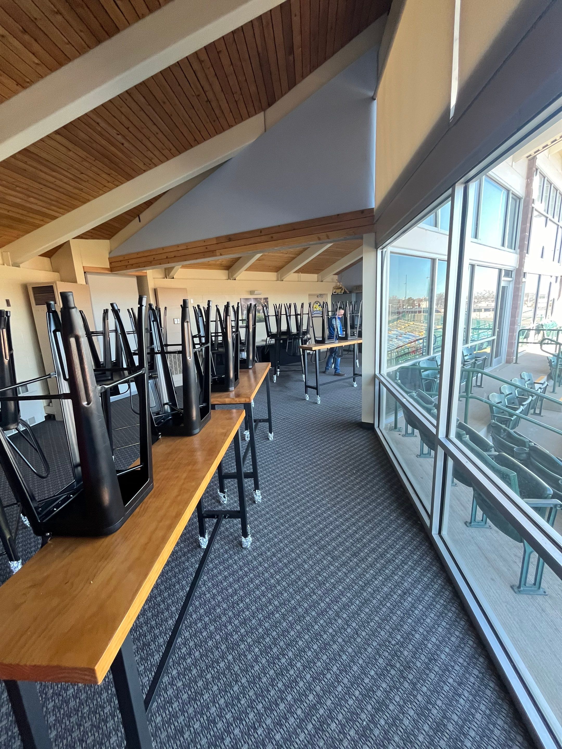 Commercial Epoxy Floor Coating for Stadium Viewing Suites in Sioux Falls by Select Painting, Coatings & Garage Cabinets