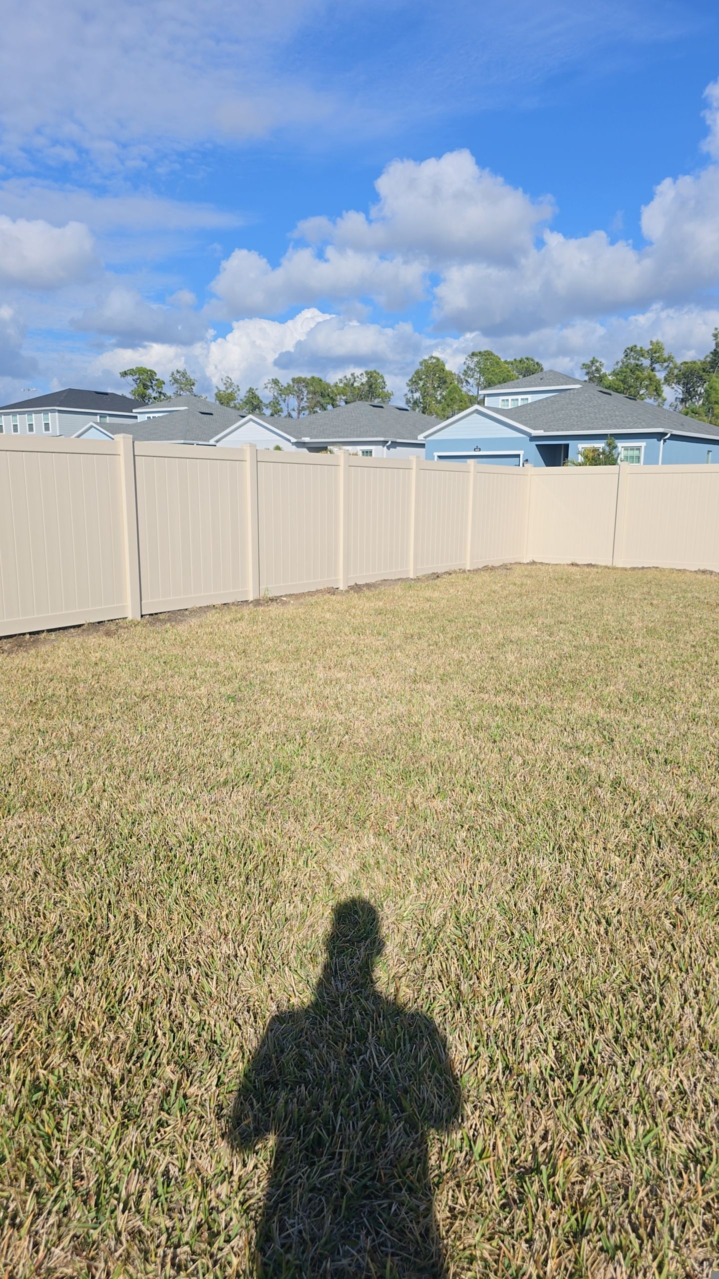 Tan Vinyl Fence in West Port by True Fence LLC