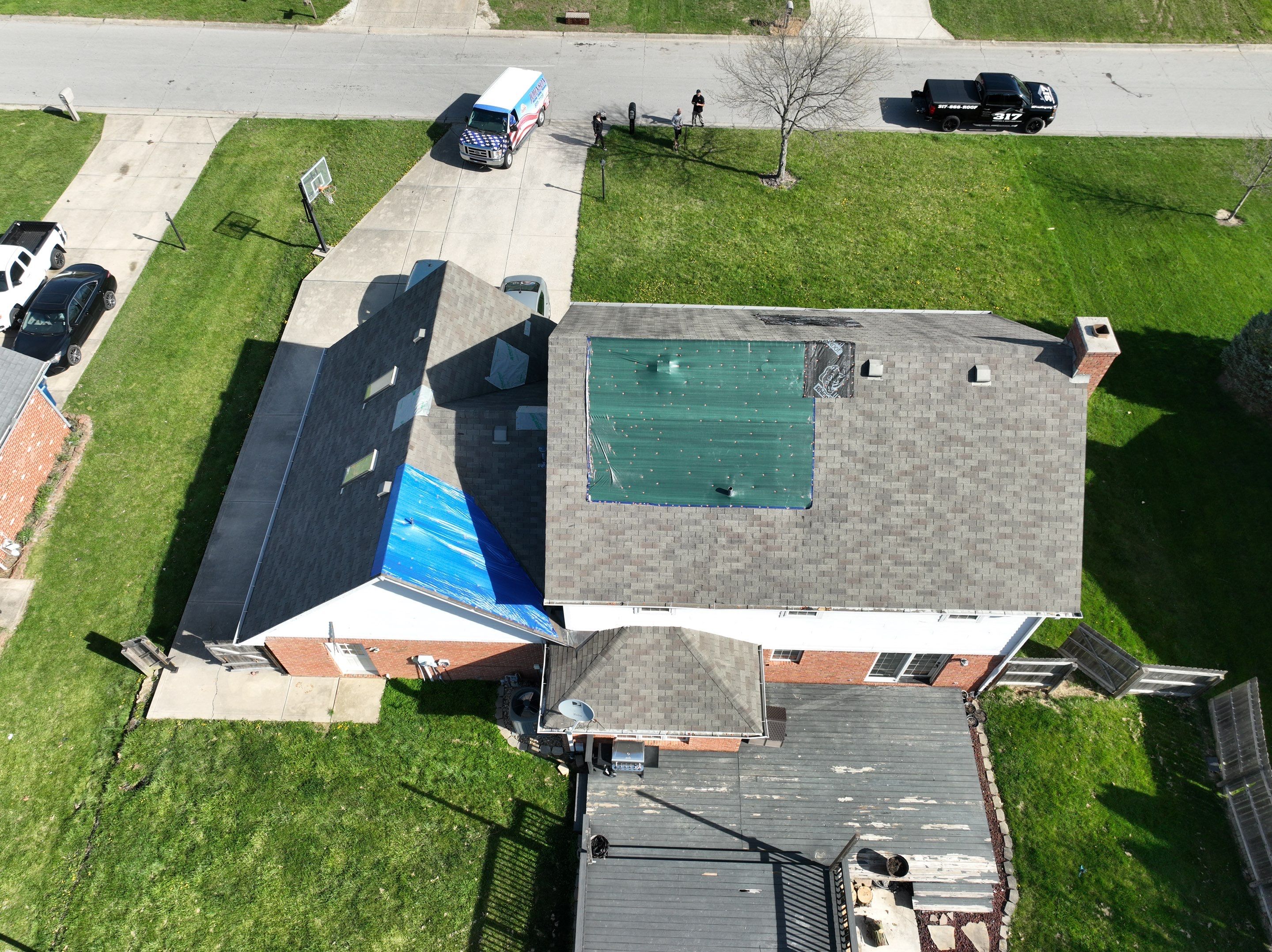 Tornado damage in Whiteland. Roof replacement, James Hardie siding, exterior paint, gutters, windows, doors by 317 Roofing & Restorations