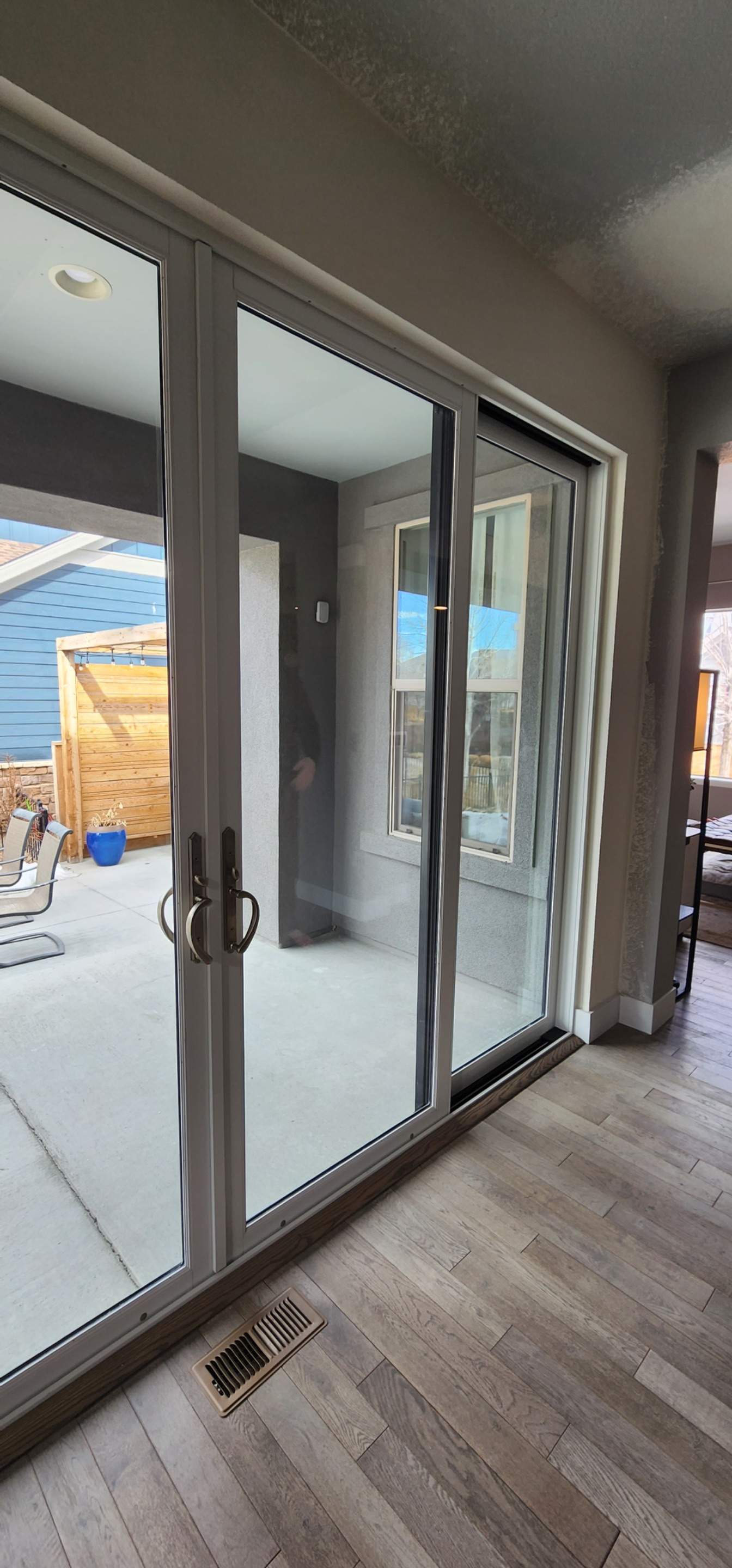 Open your space up to the outside! 4 Panel Patio door replacing 2 windows by 1st choice windows and siding