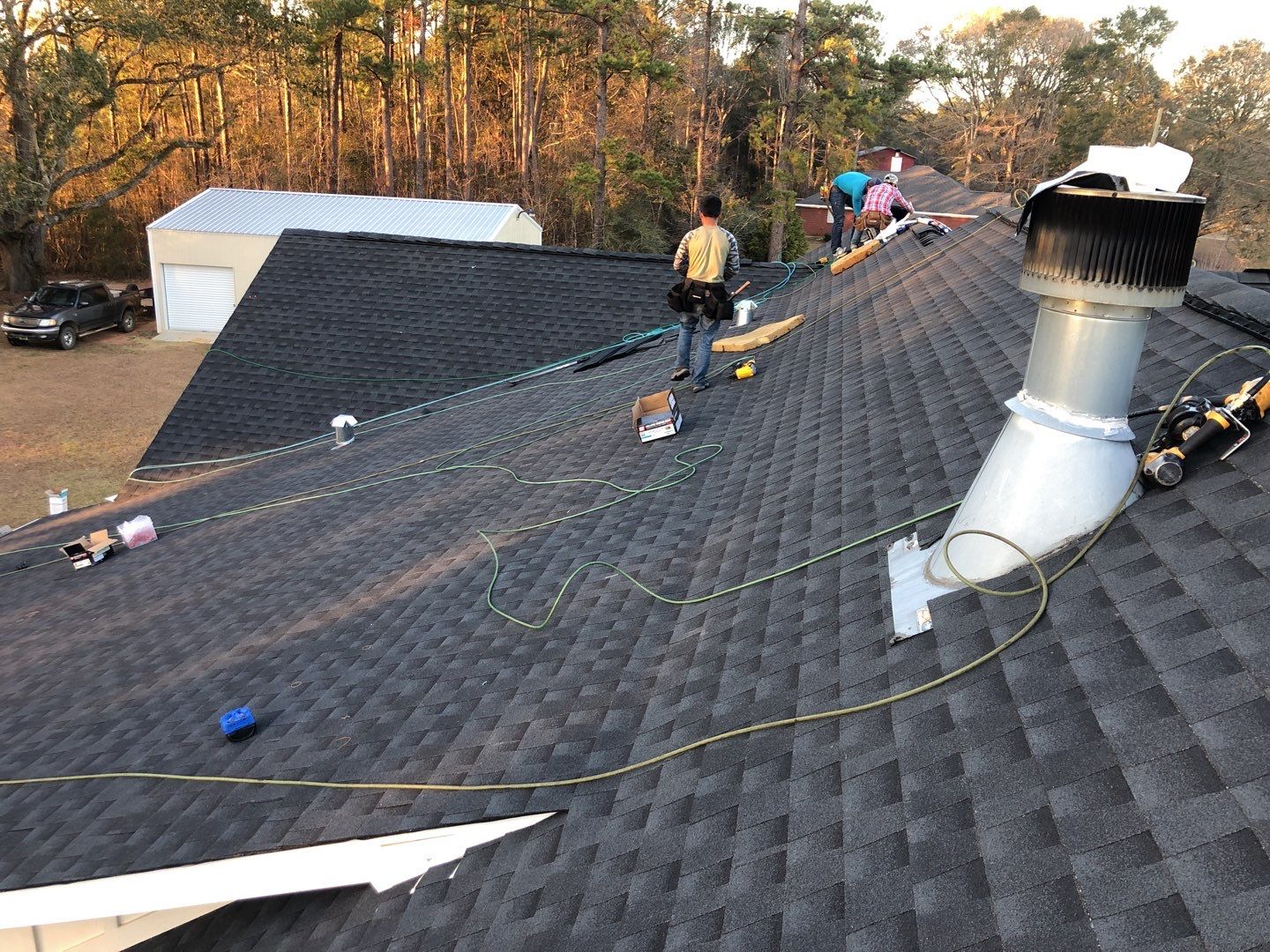 Residential Roofing Installation using Roof Replacement by American Roofing & Construction LLC