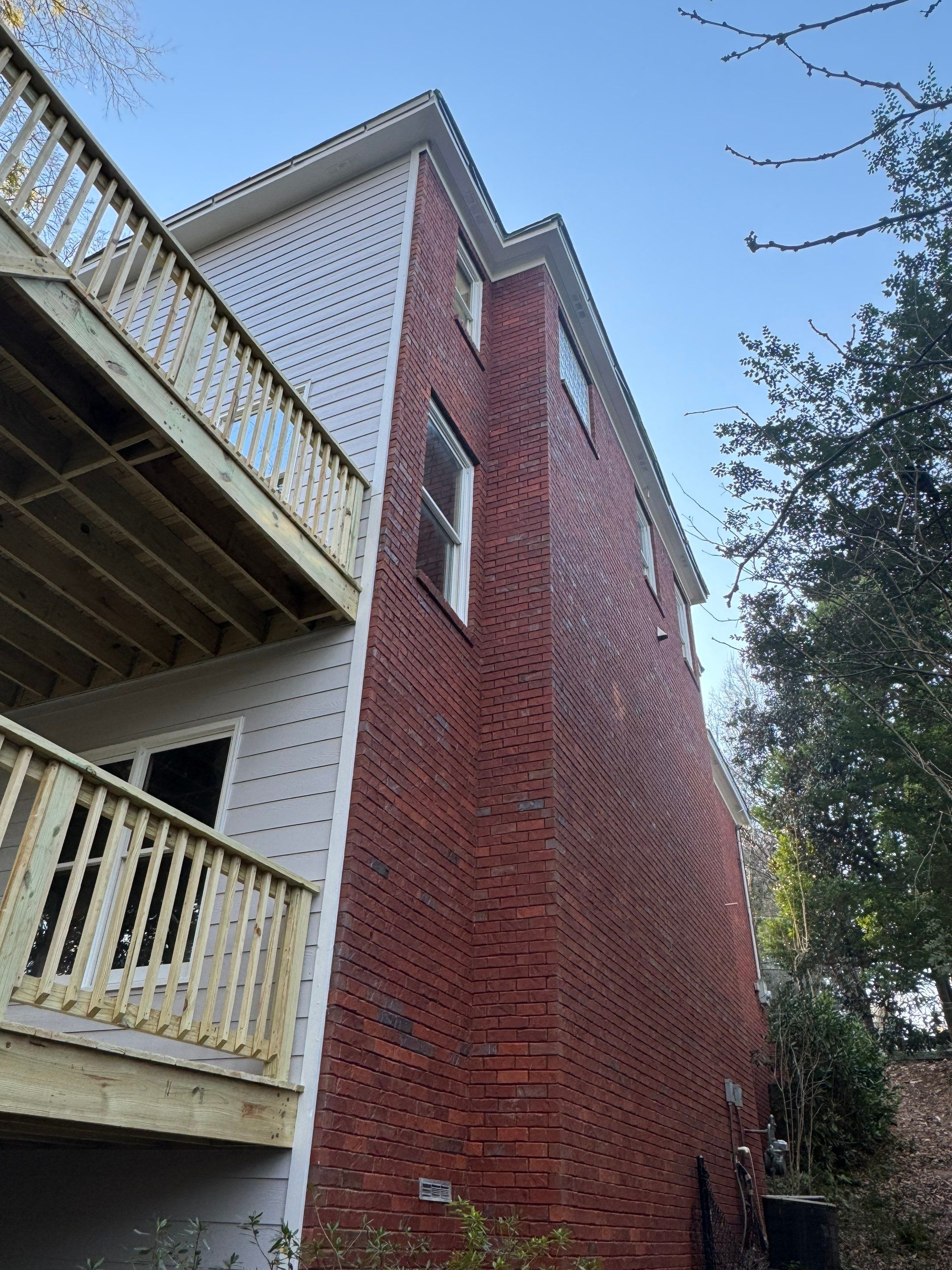Multi-Level Pressure-Treated Wooden Deck Construction in Decatur by Swift Home Renovations