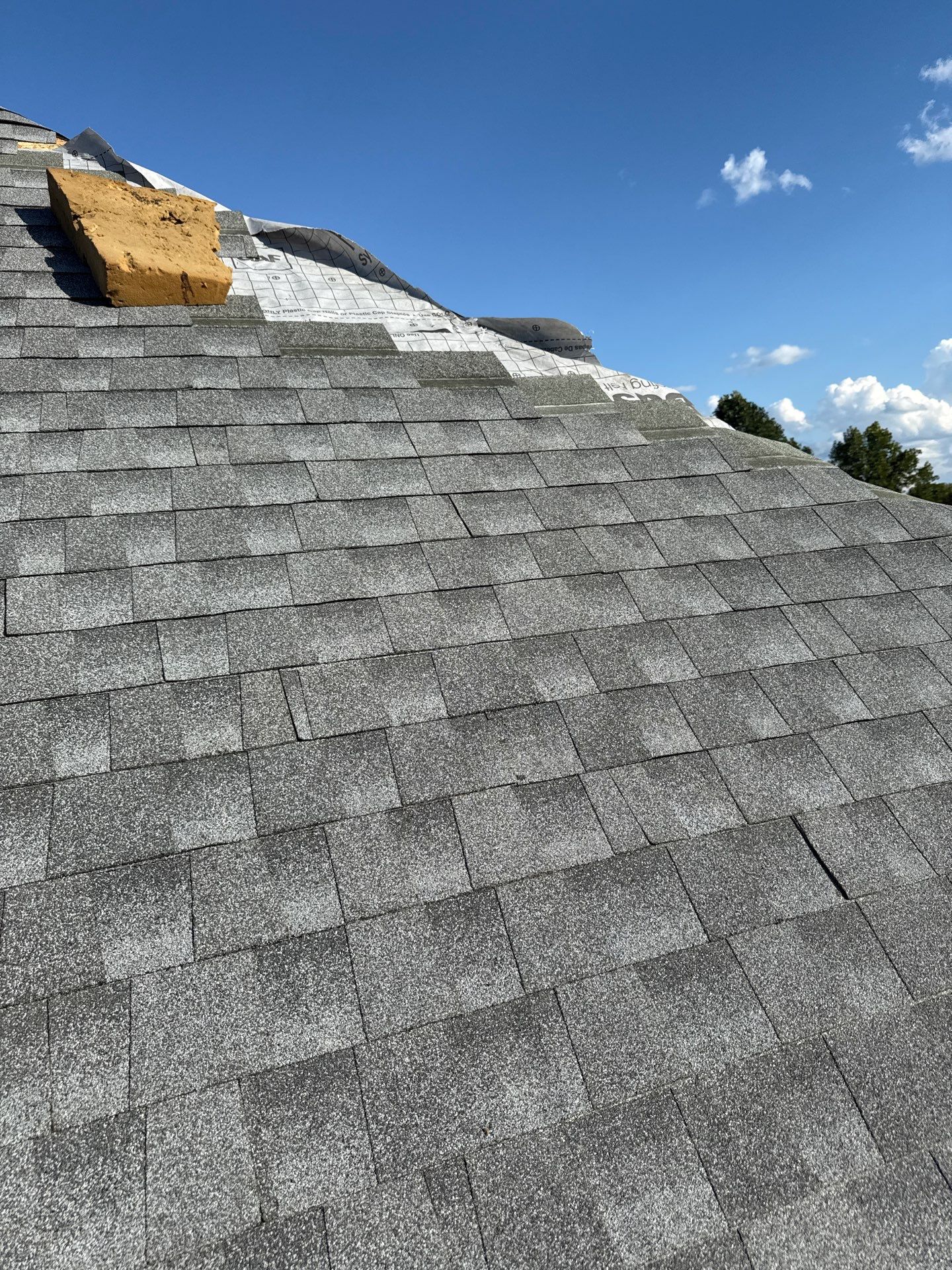 Residential Roofing Installation using GAF Timberline HDZ Oyster Grey by Rainstoppers Roofing