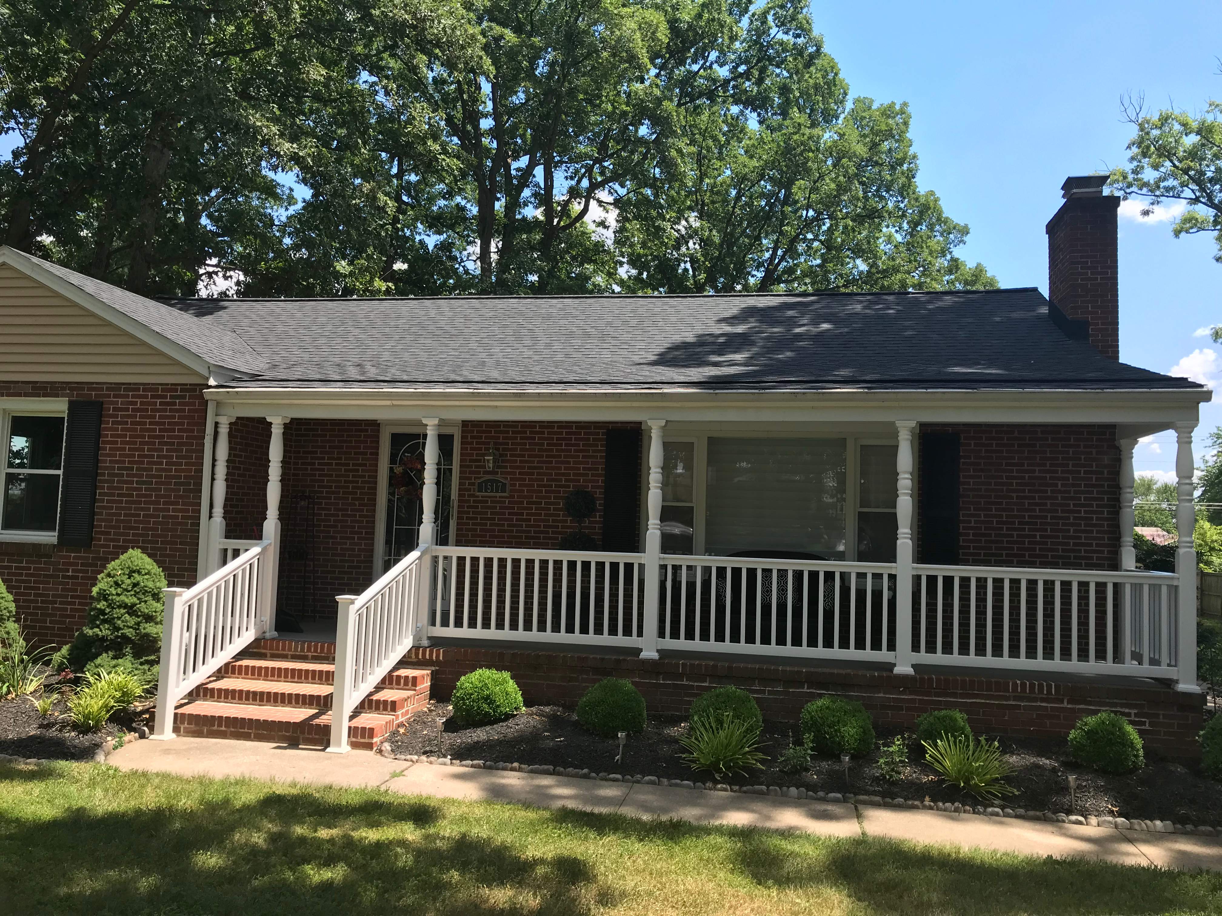 Residential Roofing Installation using Charcoal Black by Alpha Design Services