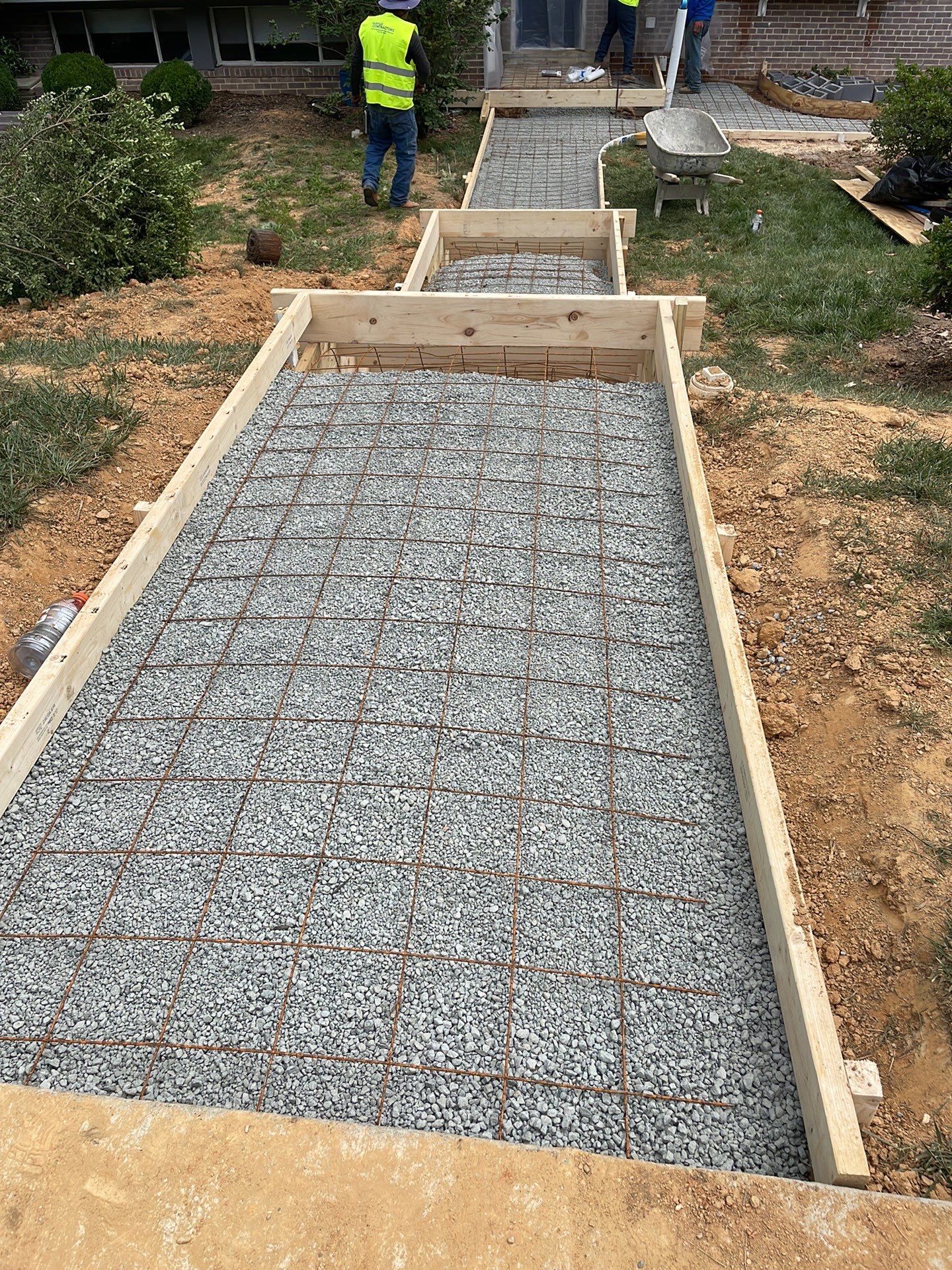 New walkway with stairs and a new front porch by Fairfax Contractors, LLC