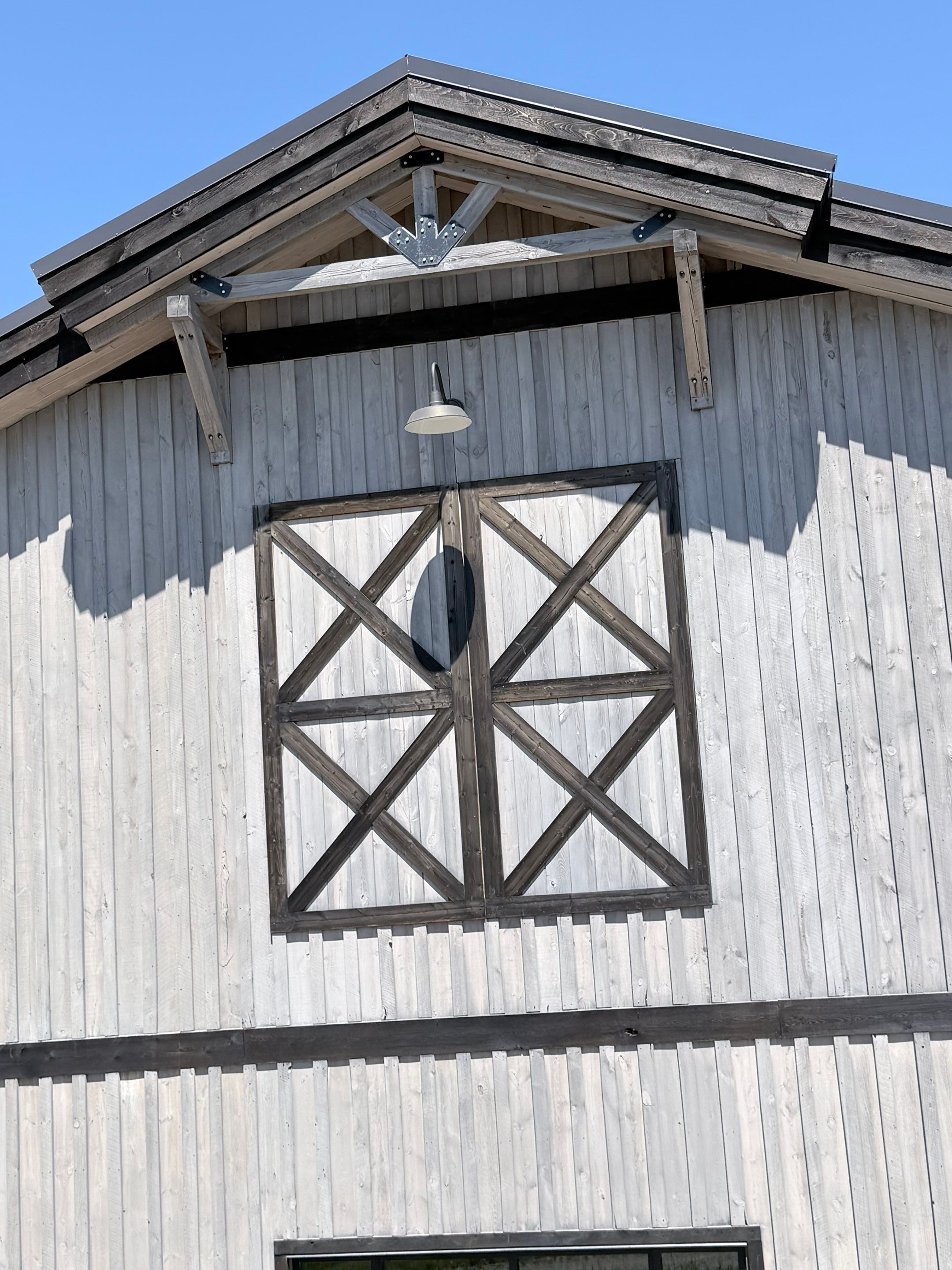 Commercial Exterior Wood Staining for Sanford Barn in Sioux Falls by Select Painting, Coatings & Garage Cabinets
