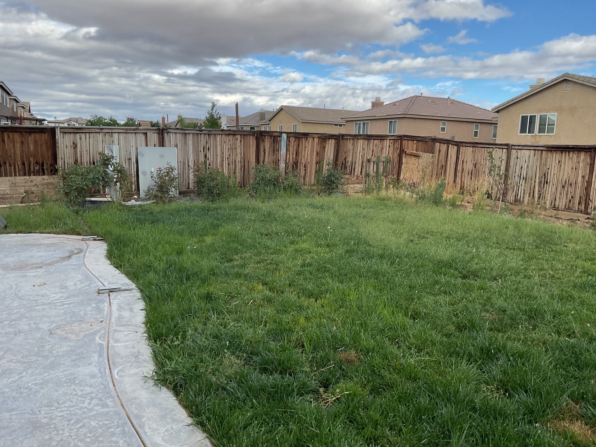 Tan Vinyl by Fence Guys Inc. 