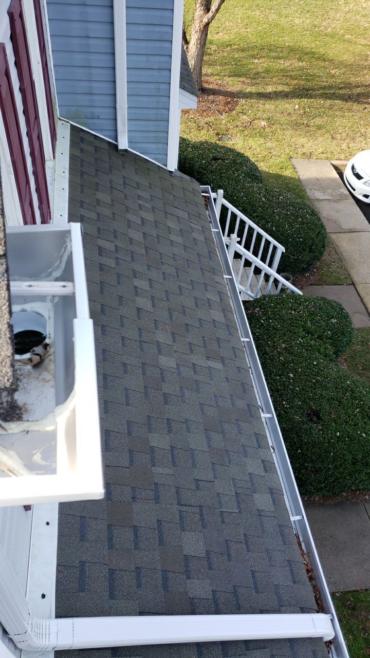 Gutter Cleaning using water by G&H Home Tech Pros LLC