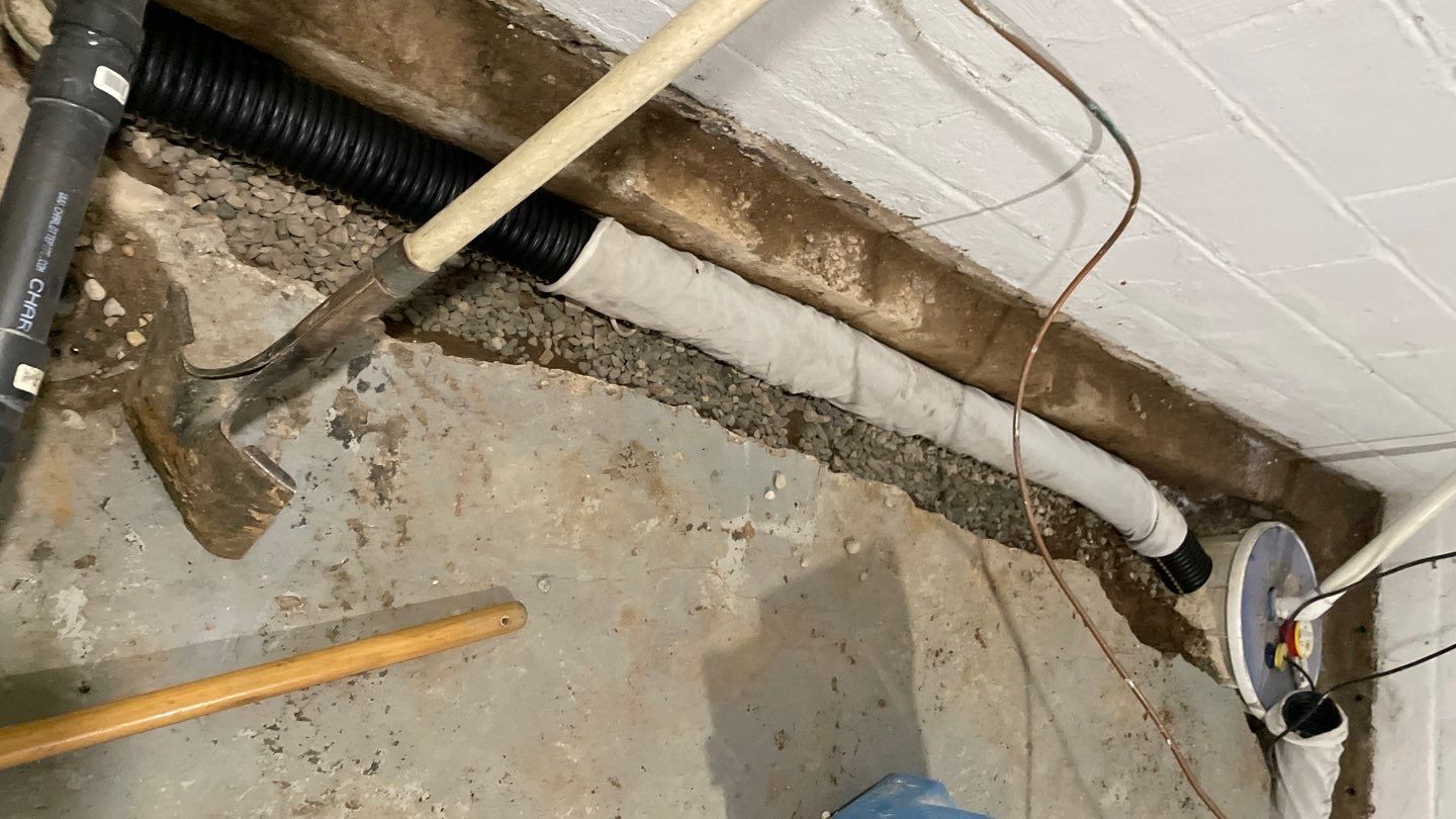 Interior Drain Tile & Yard French Drain in St. Paul, MN by Waterproofing Northeast