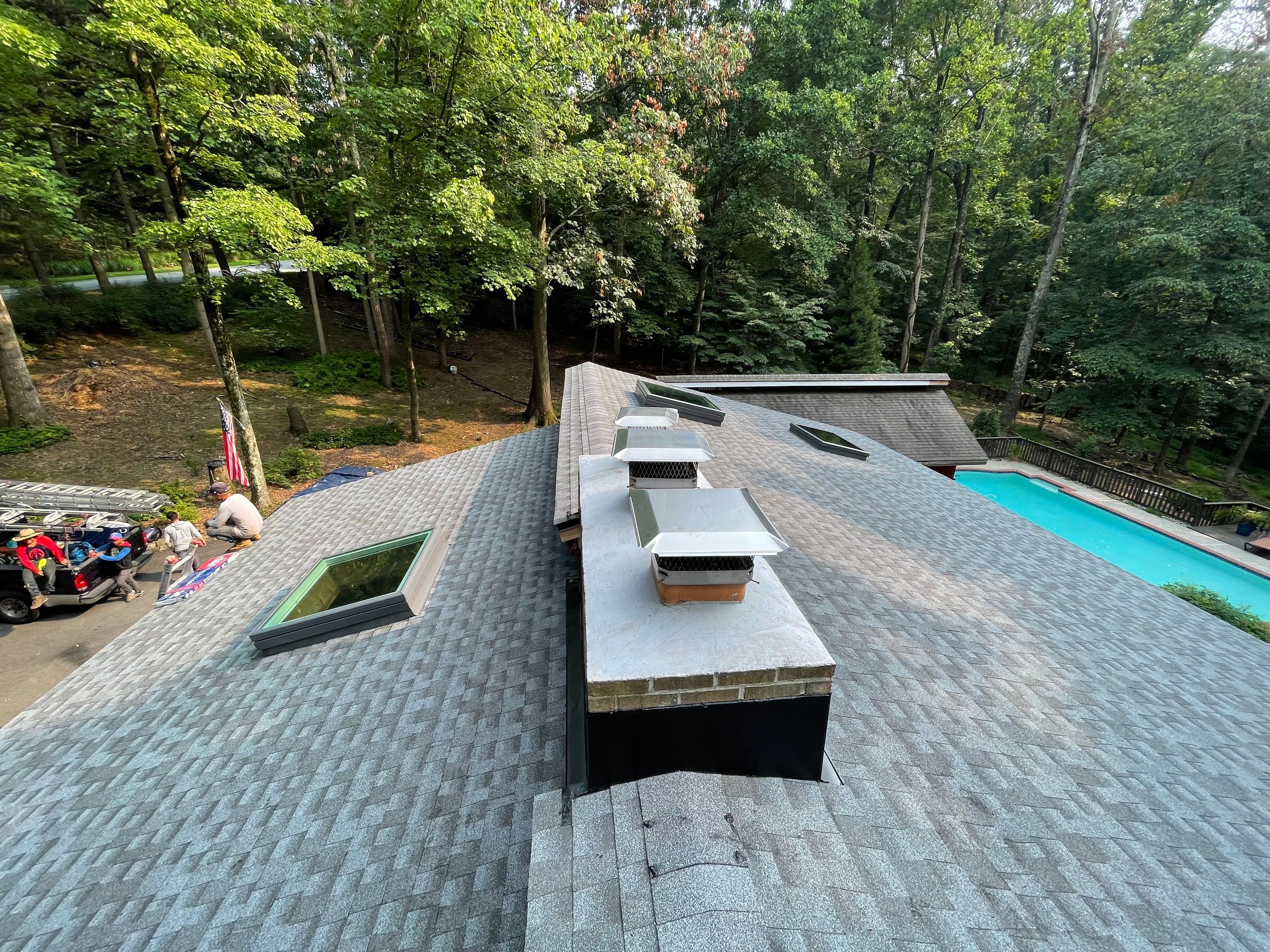Deckhouse Roof Replacement by American Home Contractors