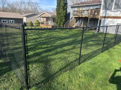 Black Vinyl-Coated Chain Link Fence Installation in Waterloo