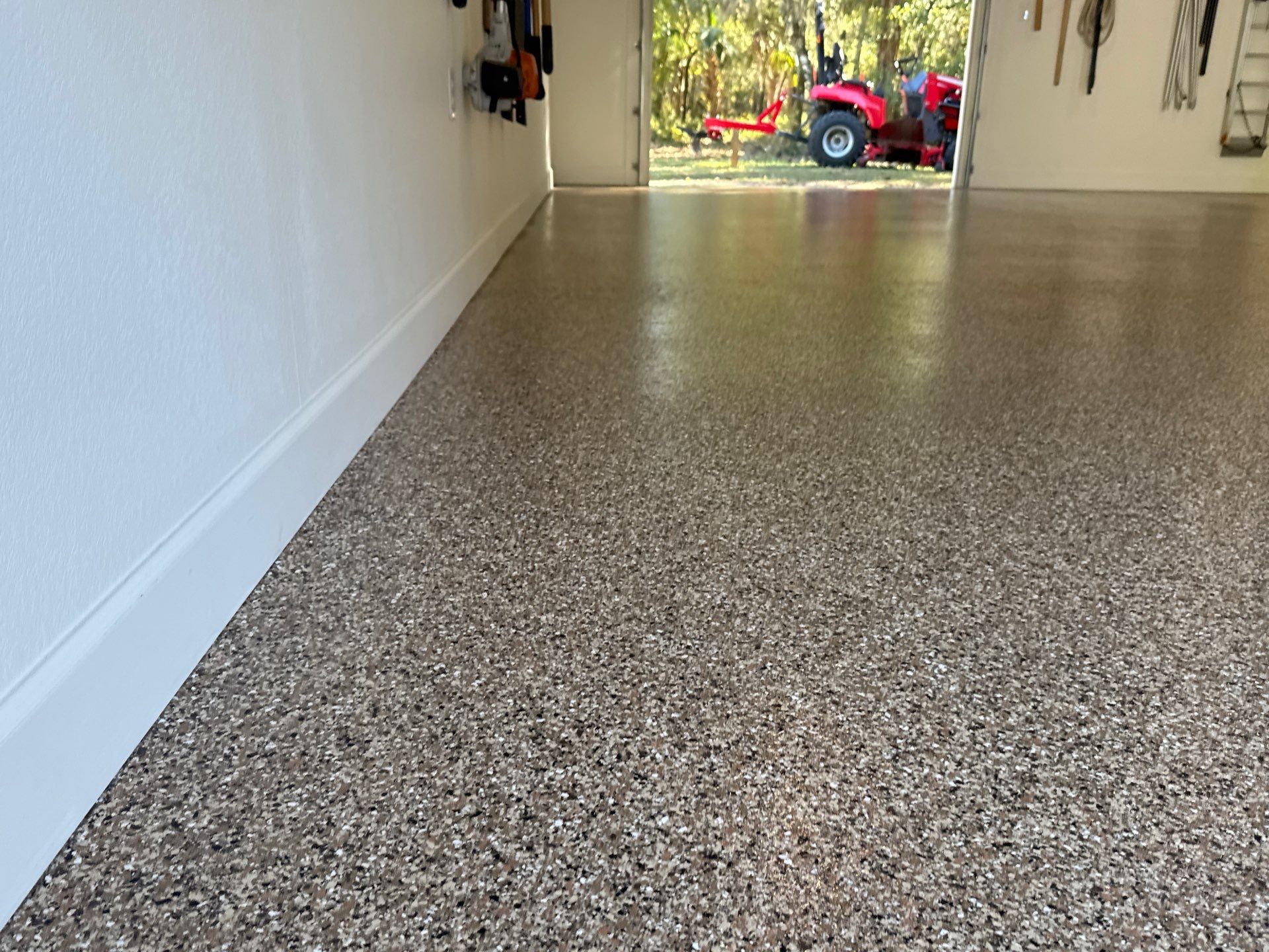 Garage in Hawthorne, FL in Sandstone by Cross Creek Concrete Coatings